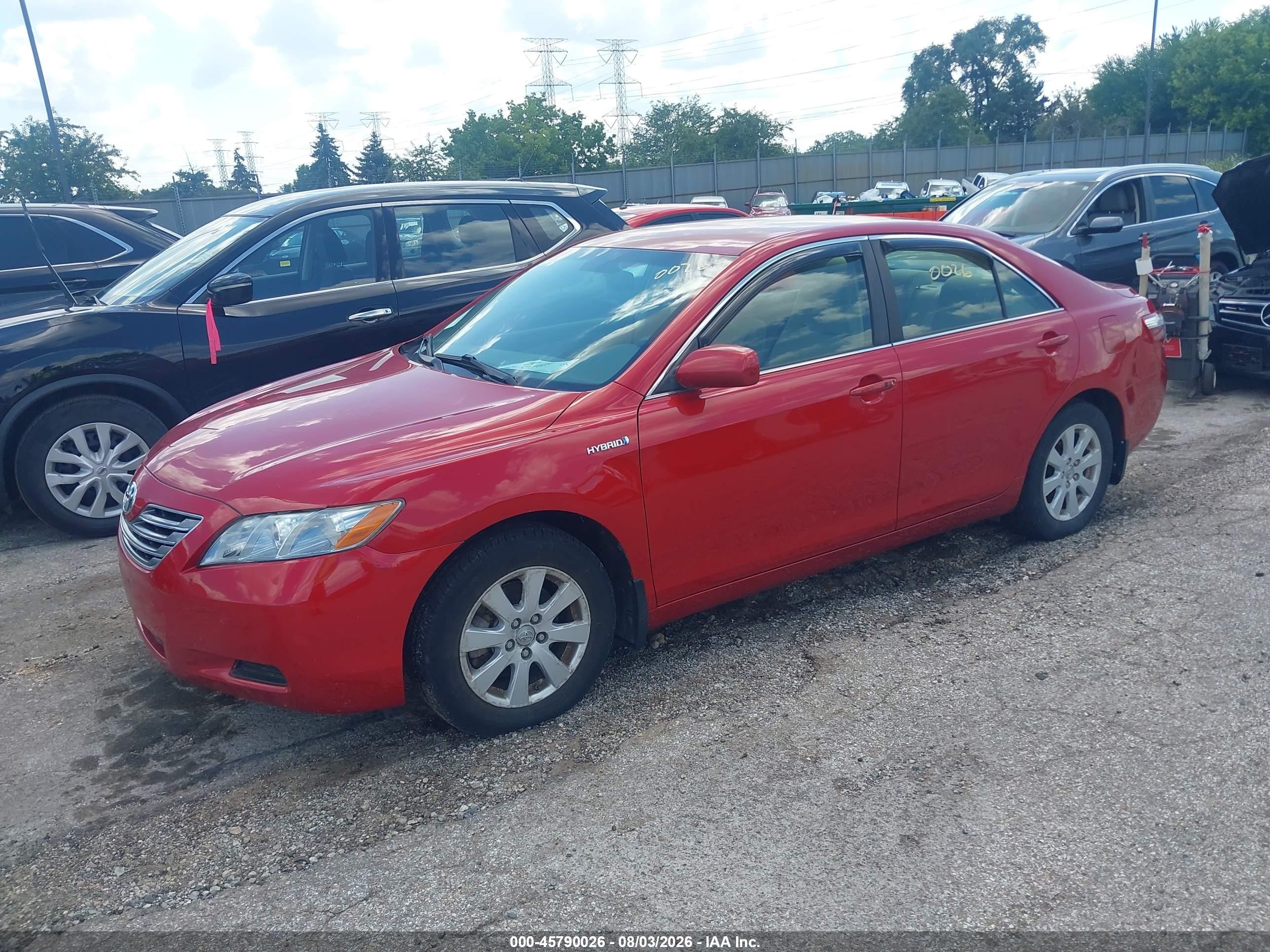 2007 Toyota Camry Hybrid   Red vin: JTNBB46K373002607