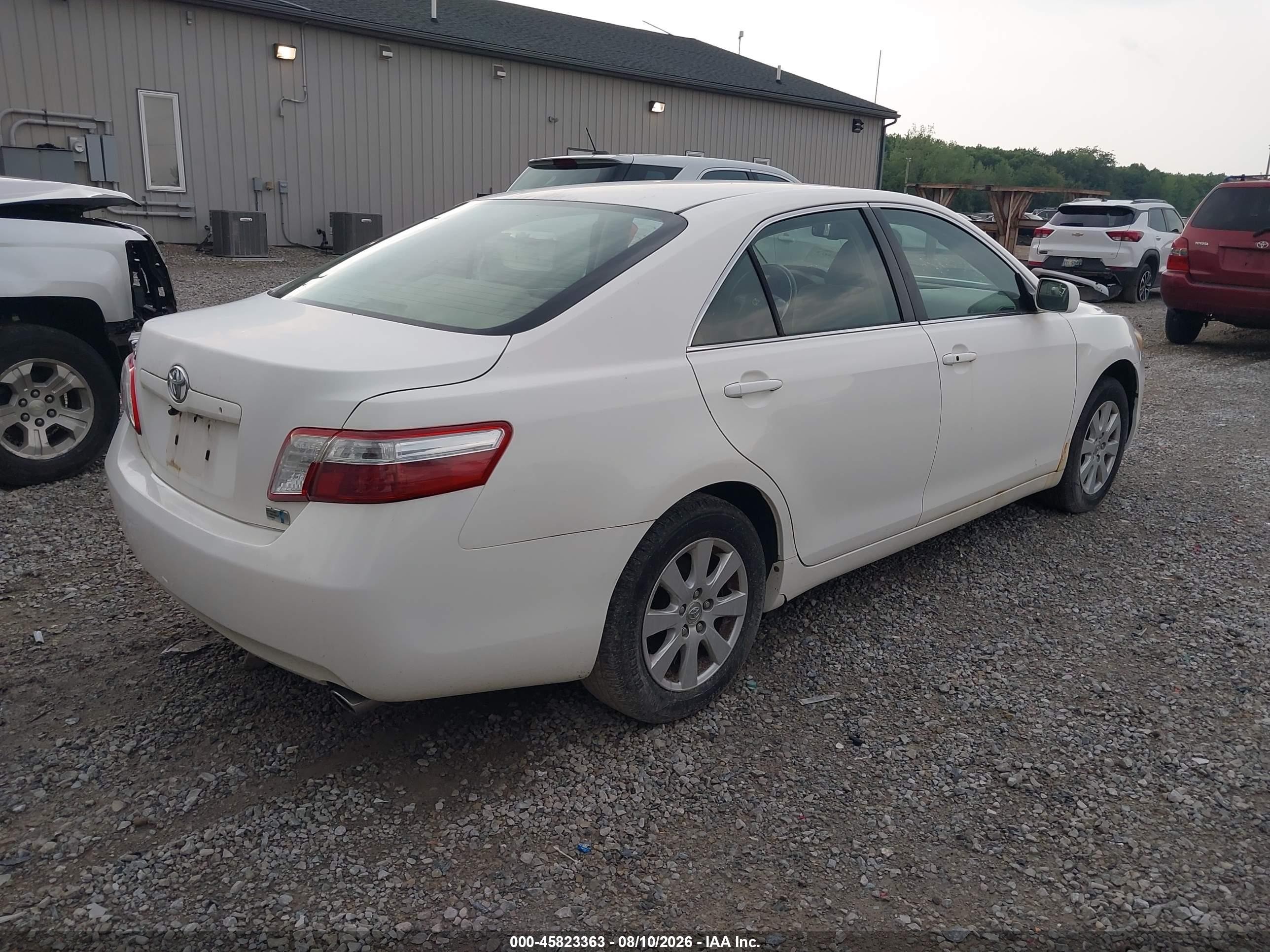 2007 Toyota Camry Hybrid   White vin: JTNBB46K473011882