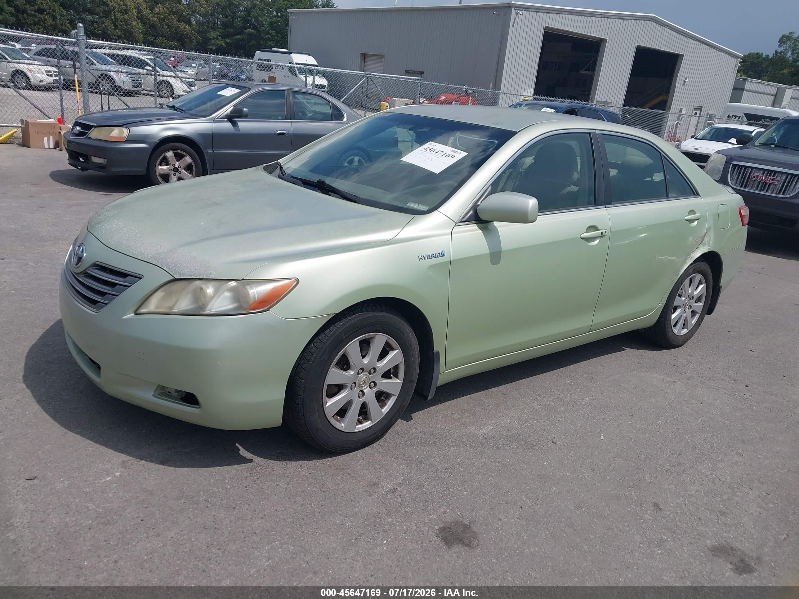 2007 Toyota Camry Hybrid   Green vin: JTNBB46K473018010