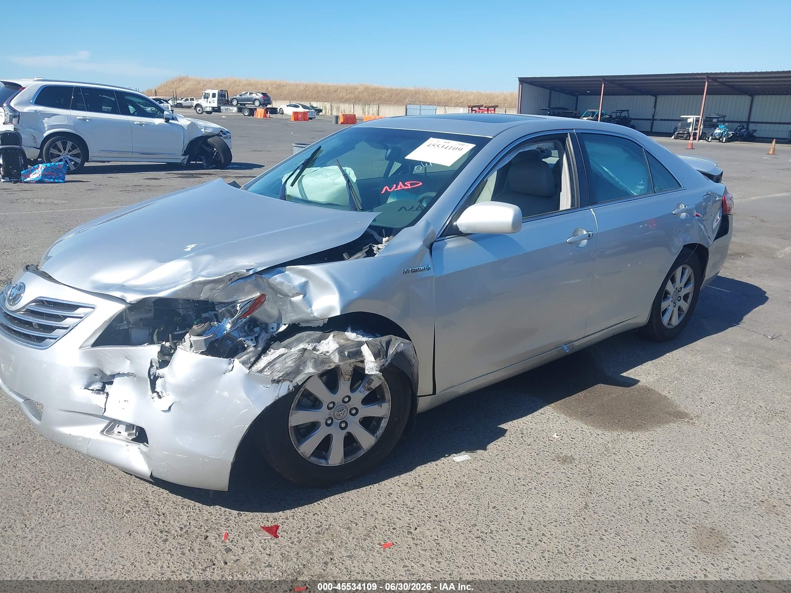 2007 Toyota Camry Hybrid Серебряный vin: JTNBB46K473025975