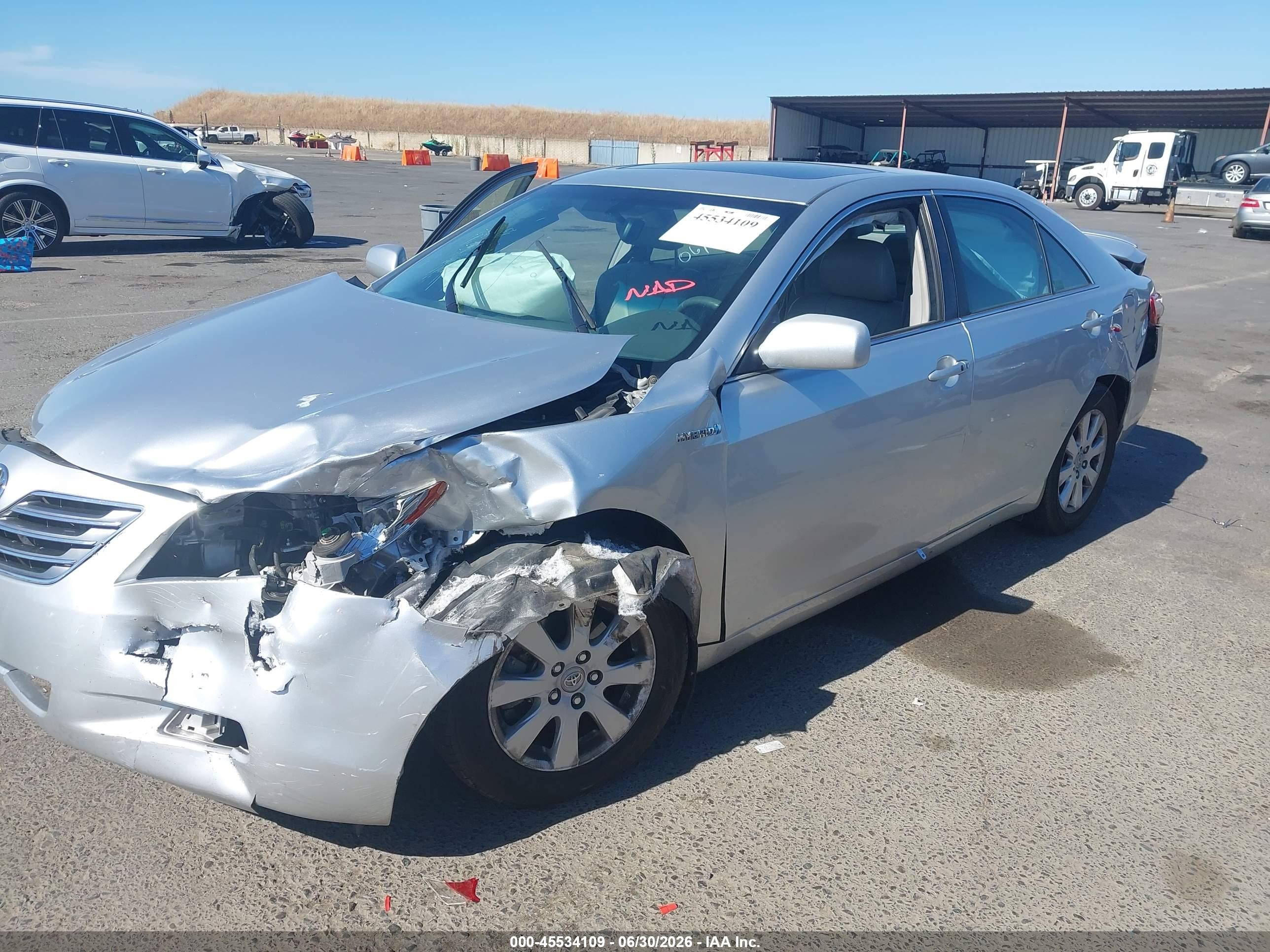 2007 Toyota Camry Hybrid Серебряный vin: JTNBB46K473025975