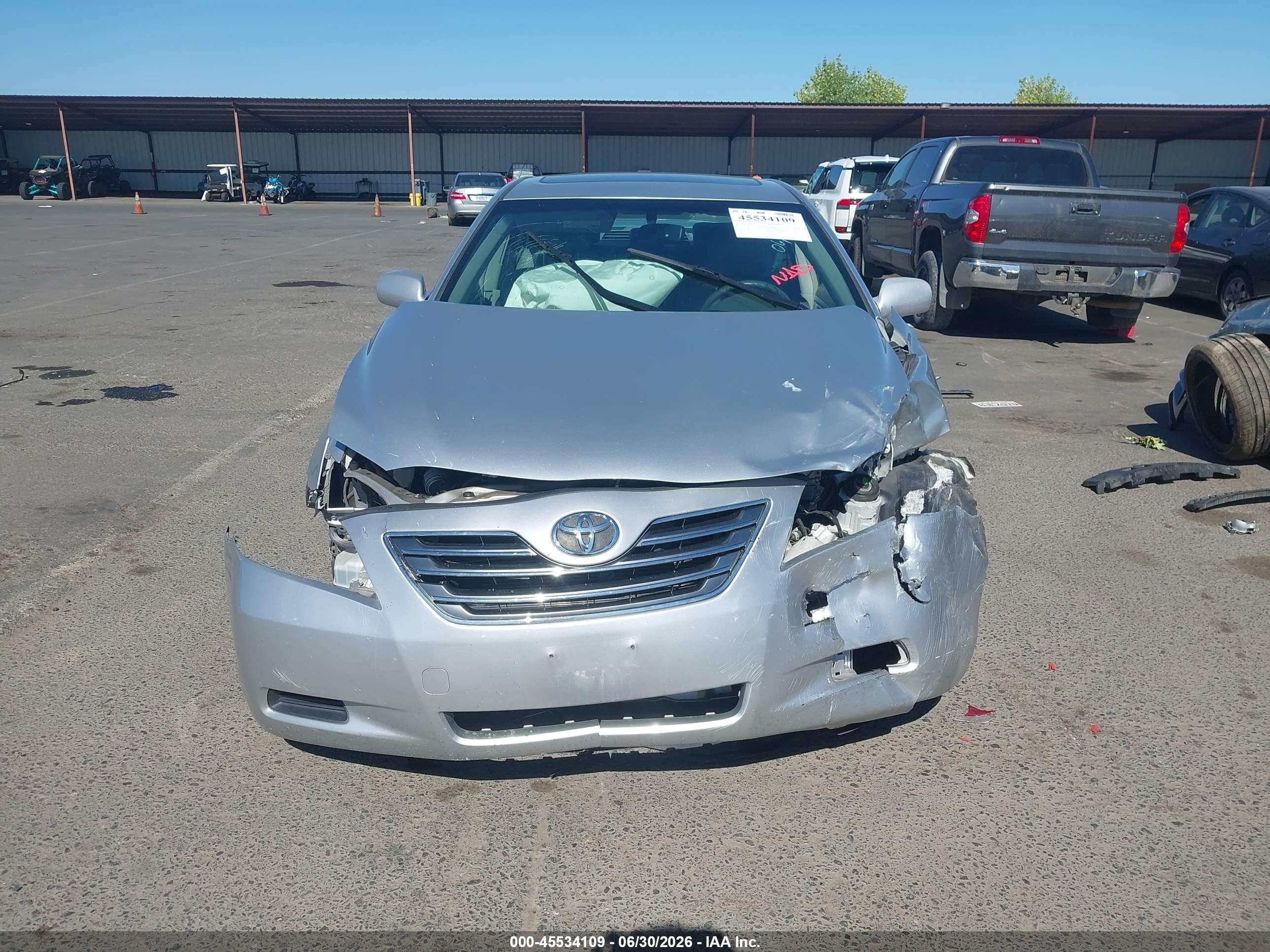 2007 Toyota Camry Hybrid Серебряный vin: JTNBB46K473025975