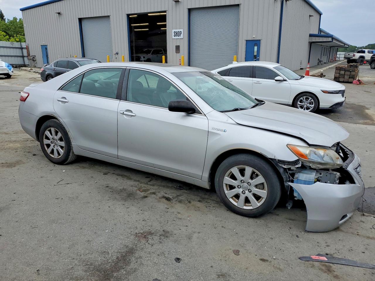 2009 Toyota Camry Hybrid Base Серебряный vin: JTNBB46K493050281
