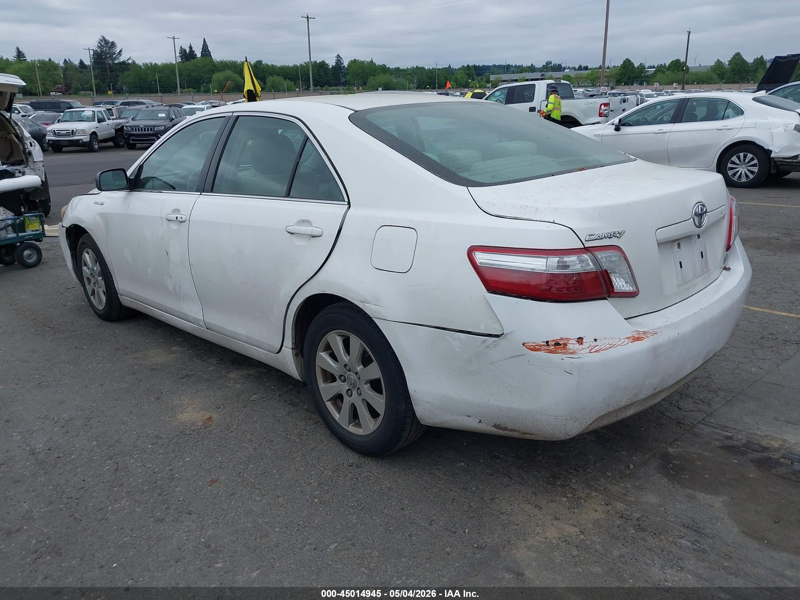 2007 Toyota Camry Hybrid   White vin: JTNBB46K573022566
