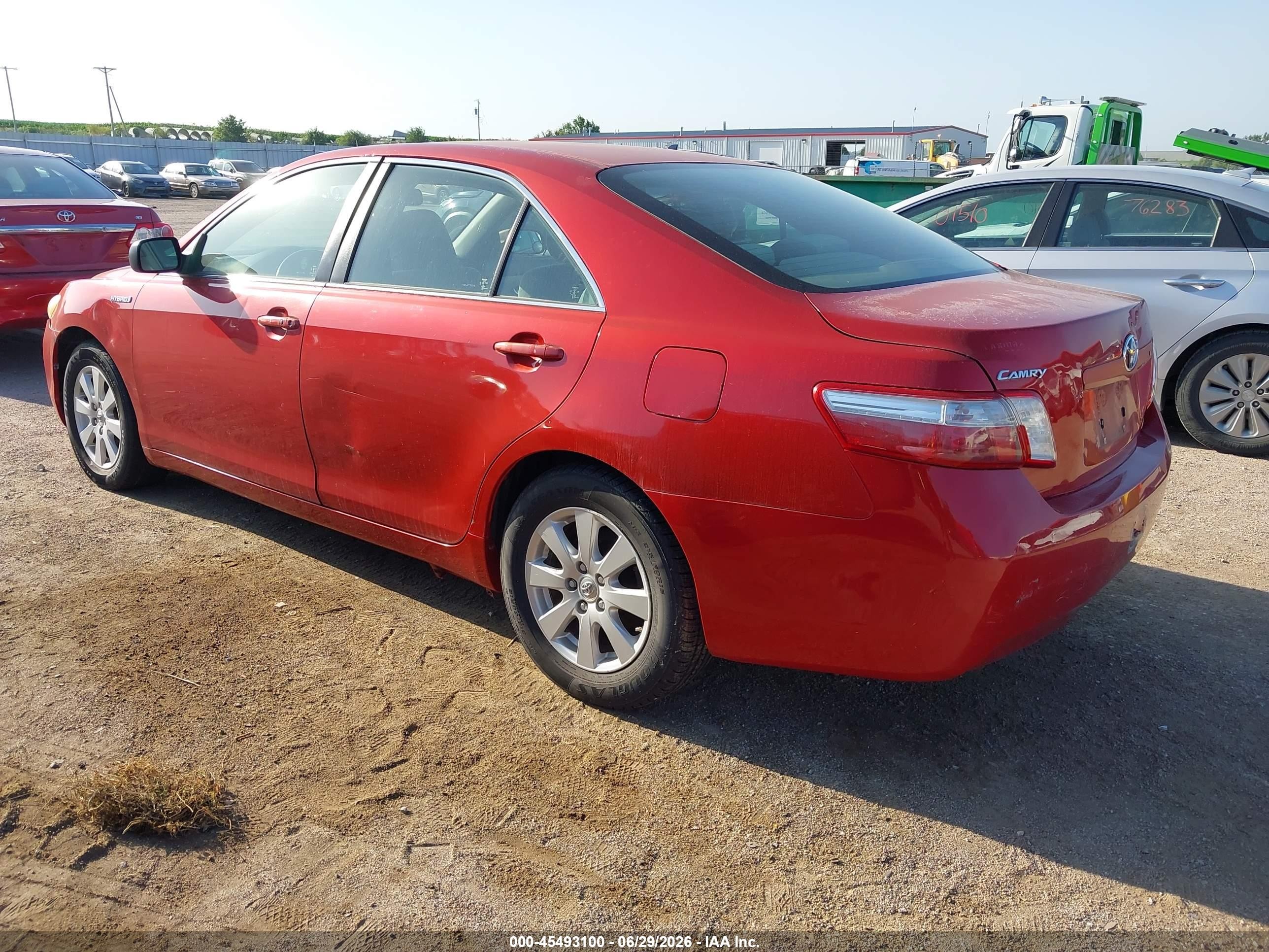 2007 Toyota Camry Hybrid   Red vin: JTNBB46K773003338