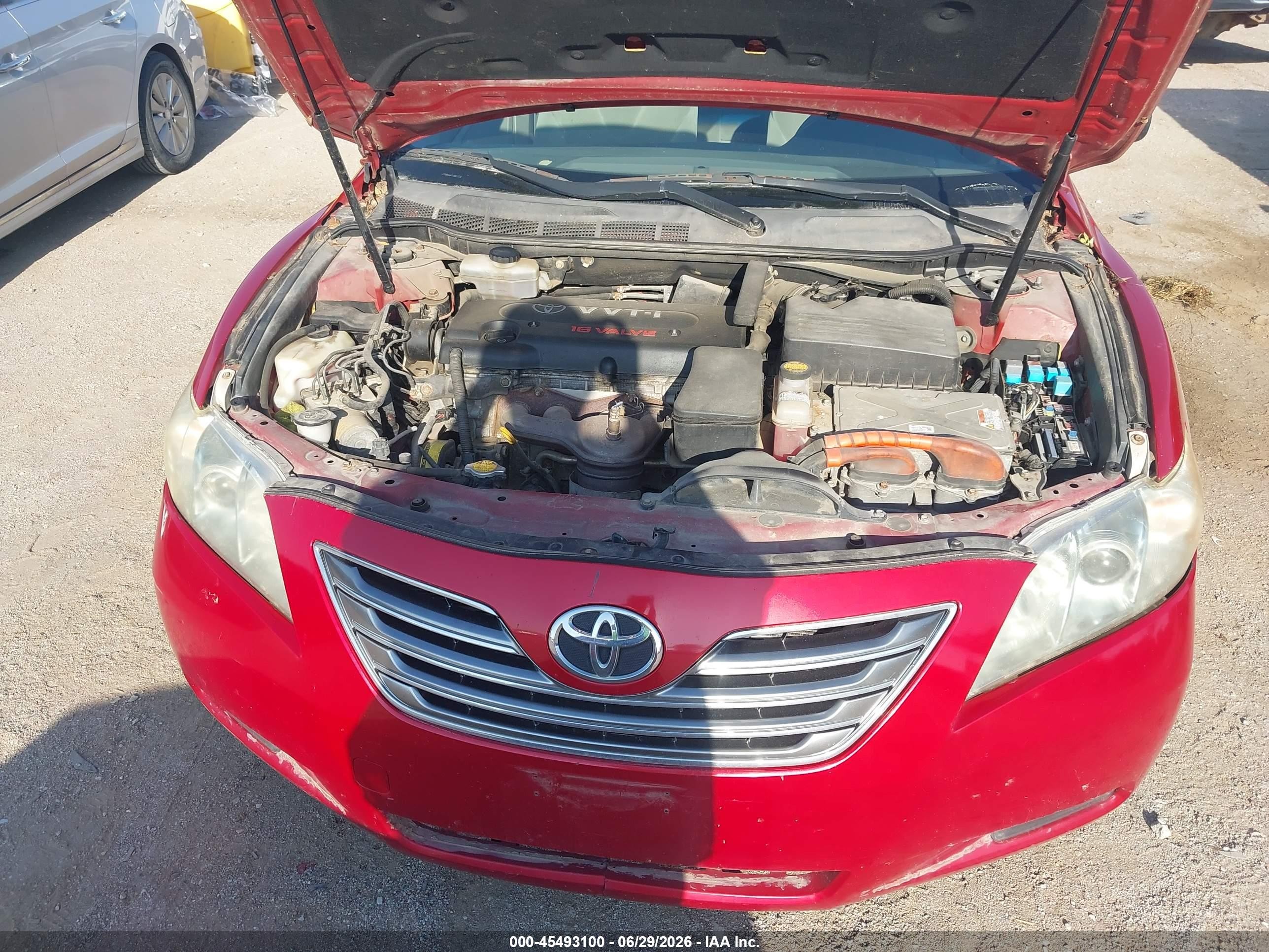 2007 Toyota Camry Hybrid   Red vin: JTNBB46K773003338