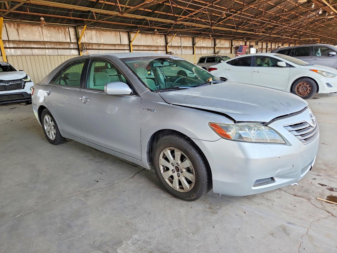 2007 Toyota Camry Hybrid Серебряный vin: JTNBB46K773033696