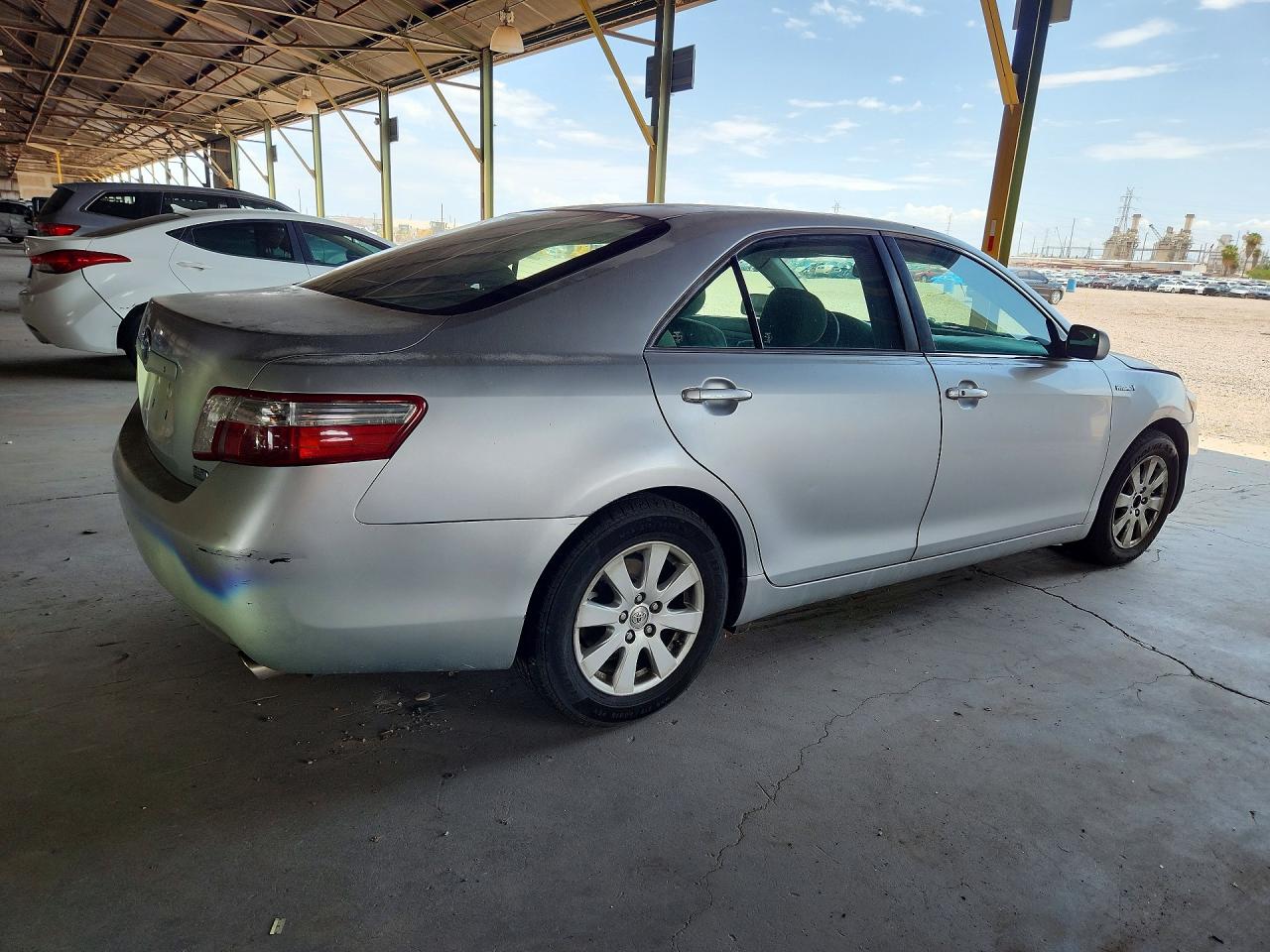 2007 Toyota Camry Hybrid Серебряный vin: JTNBB46K773033696