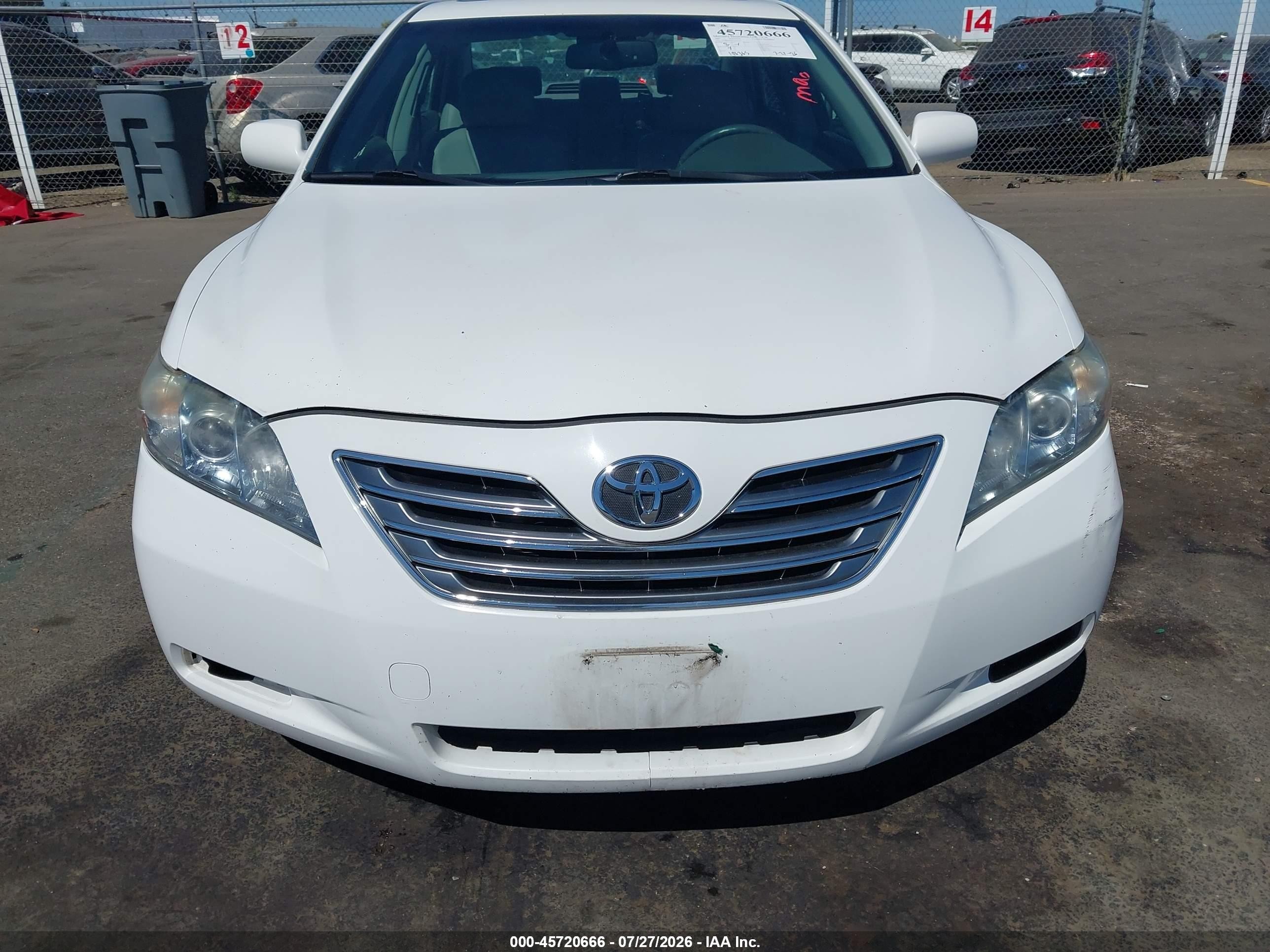 2007 Toyota Camry Hybrid   White vin: JTNBB46K873010217