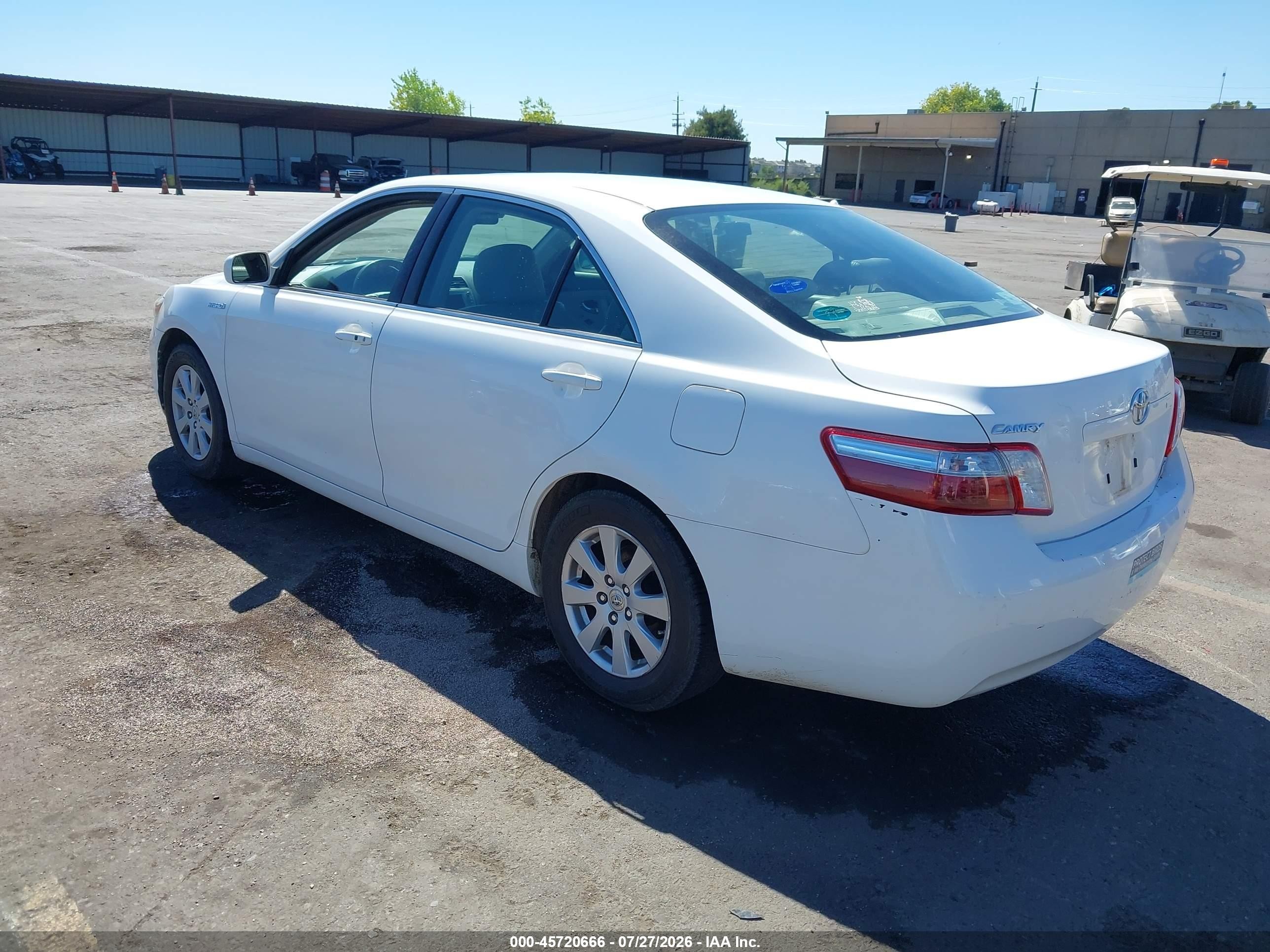2007 Toyota Camry Hybrid   White vin: JTNBB46K873010217