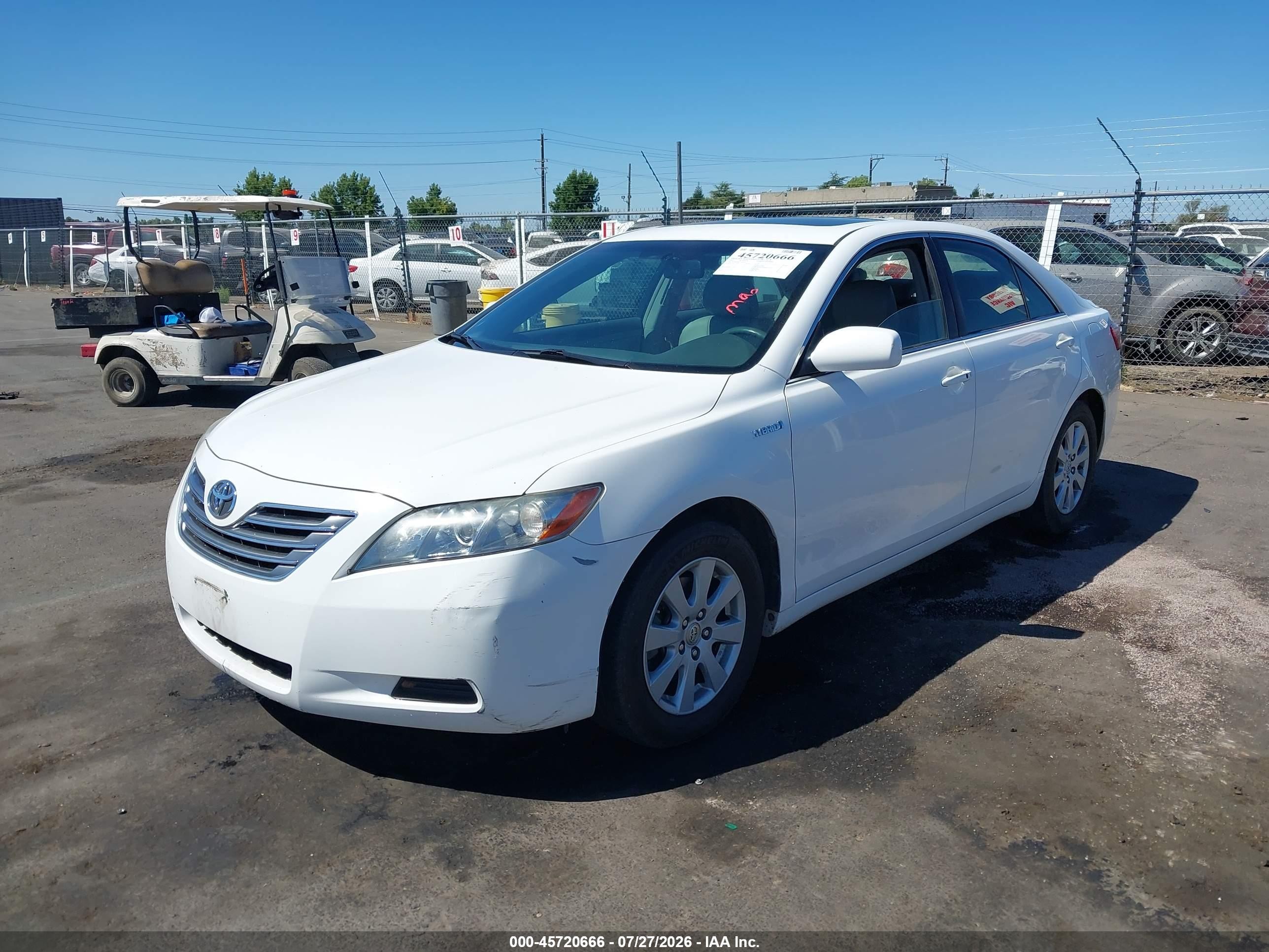 2007 Toyota Camry Hybrid   White vin: JTNBB46K873010217