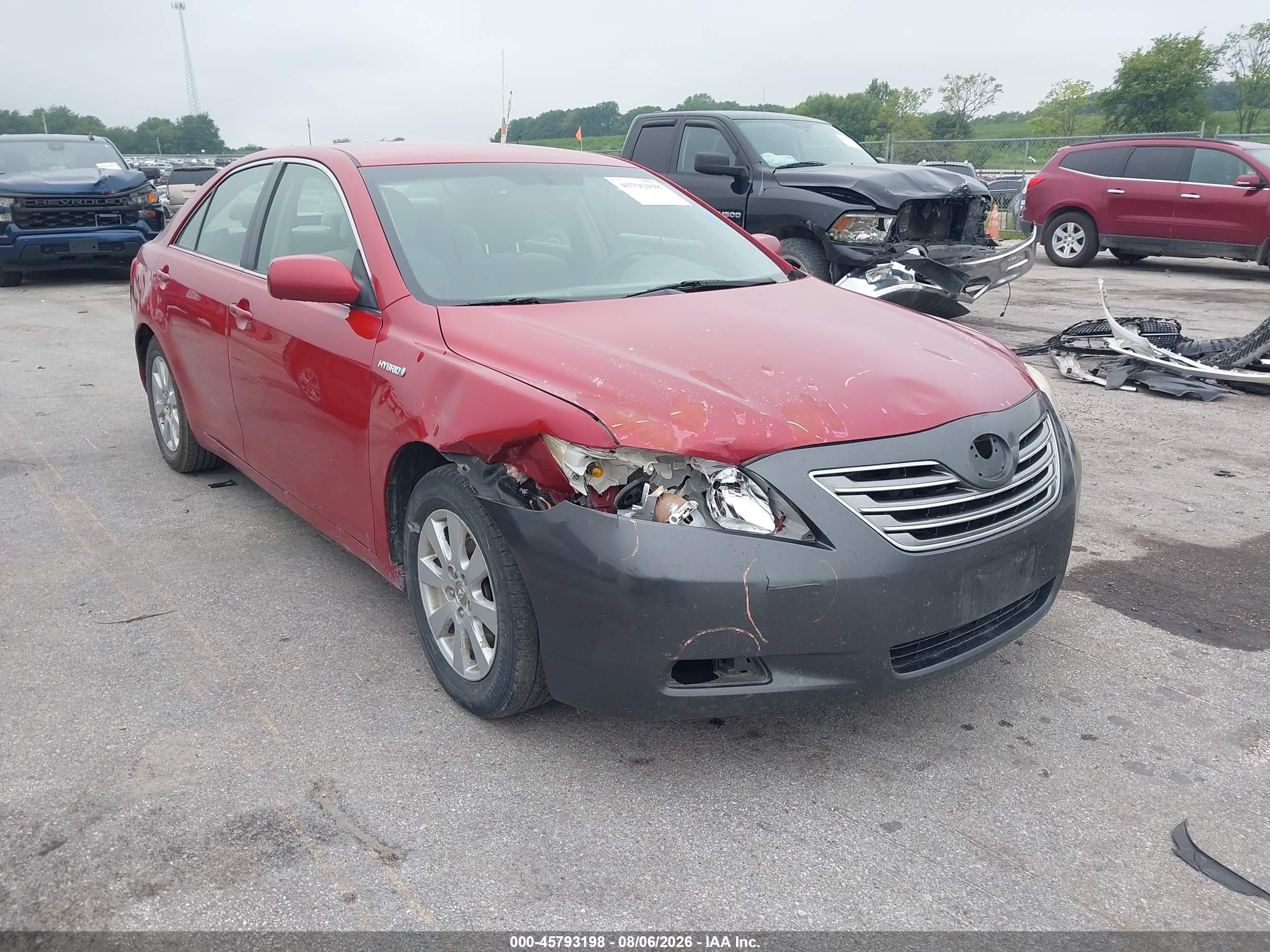 2007 Toyota Camry Hybrid   Red vin: JTNBB46K973003440