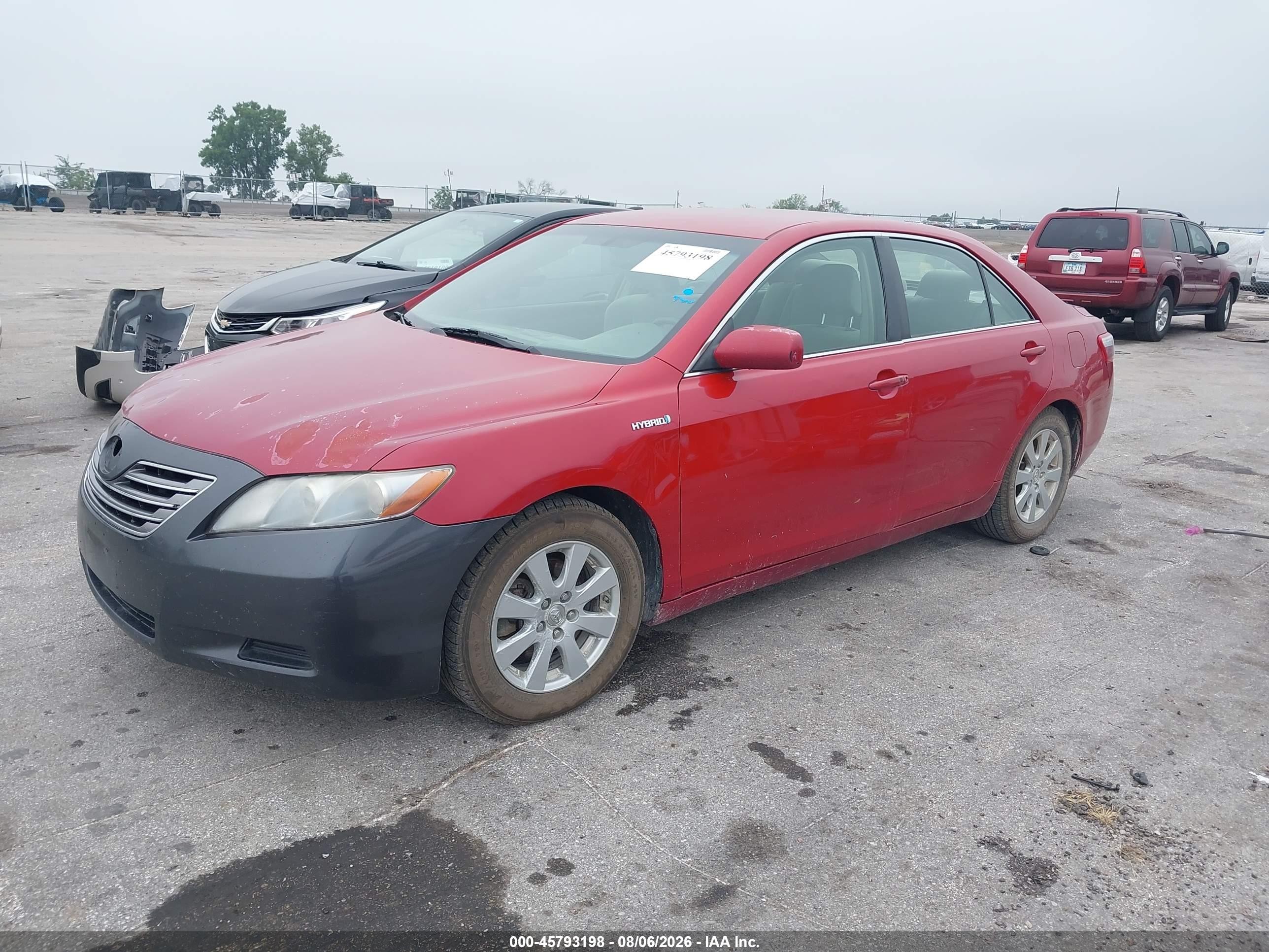 2007 Toyota Camry Hybrid   Red vin: JTNBB46K973003440