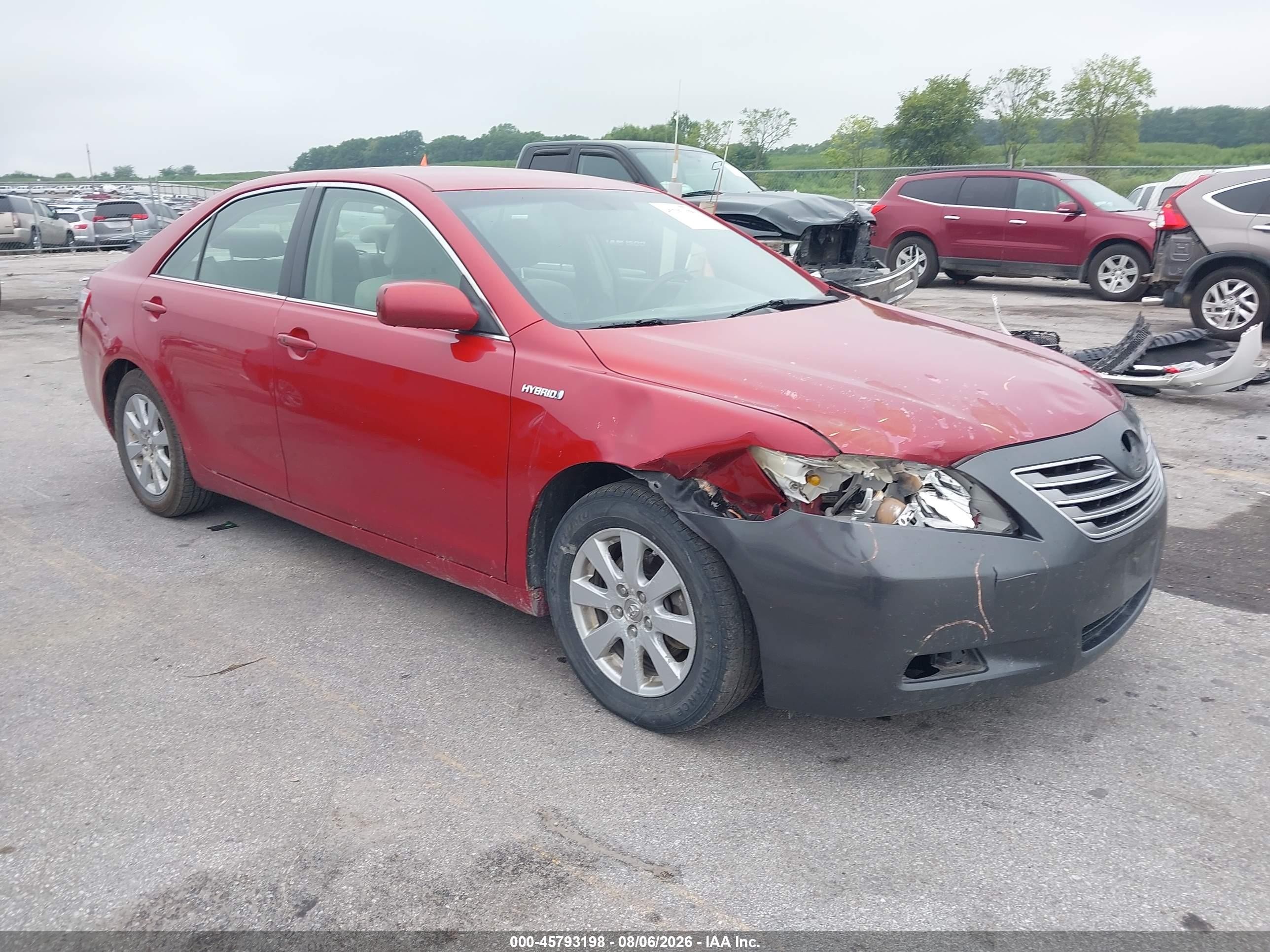 2007 Toyota Camry Hybrid   Red vin: JTNBB46K973003440