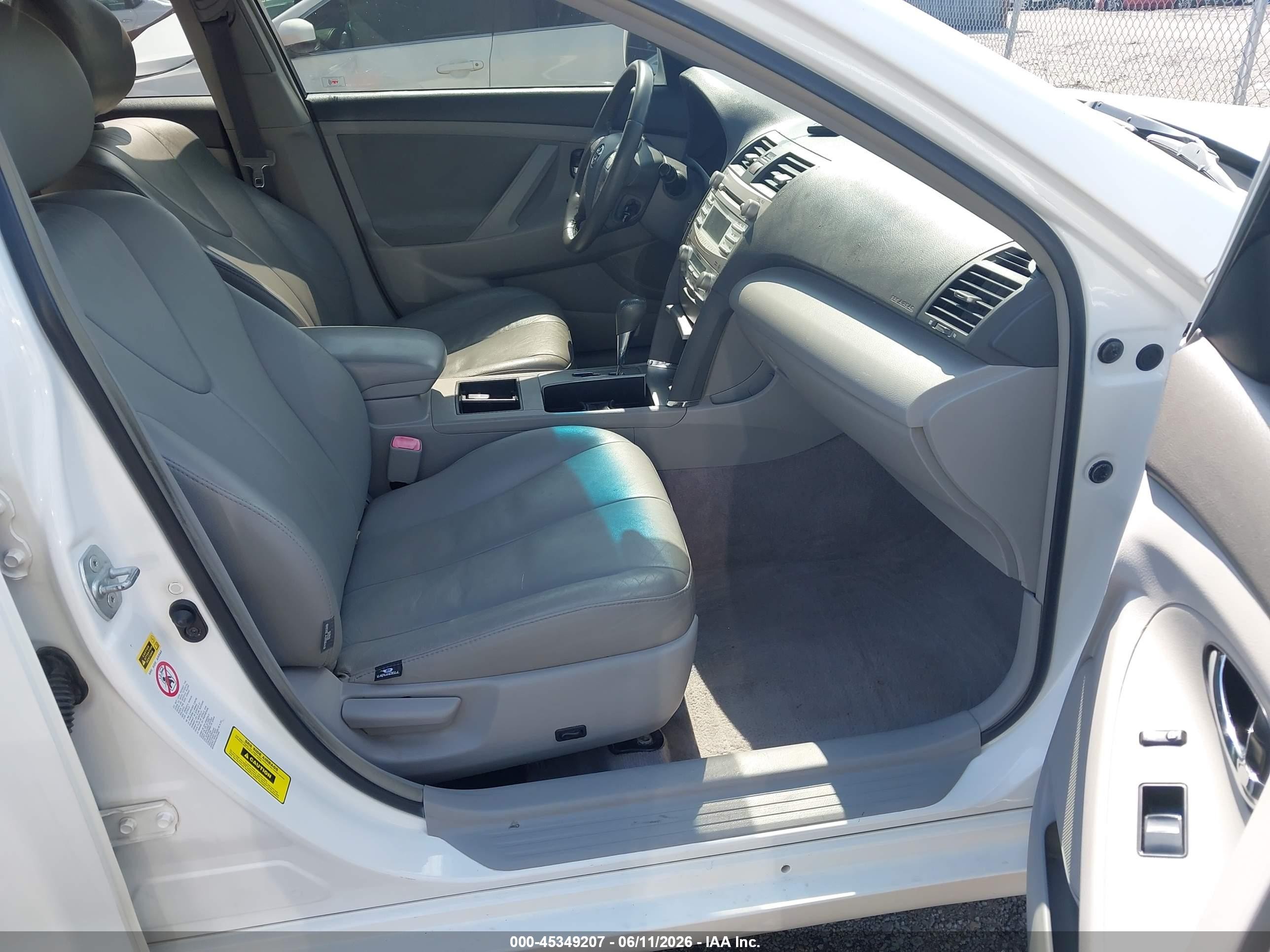 2007 Toyota Camry Hybrid   White vin: JTNBB46K973025454