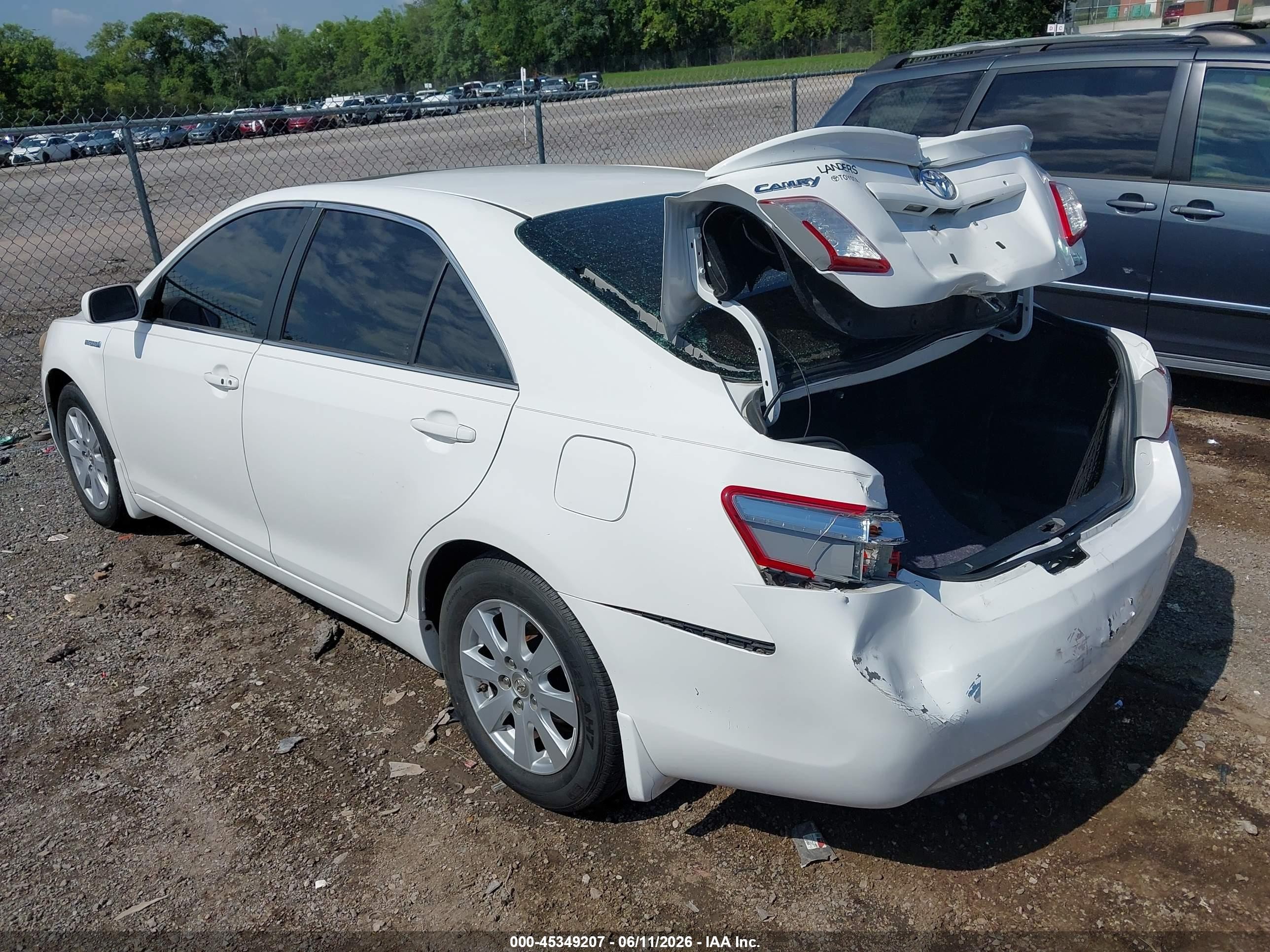 2007 Toyota Camry Hybrid   White vin: JTNBB46K973025454