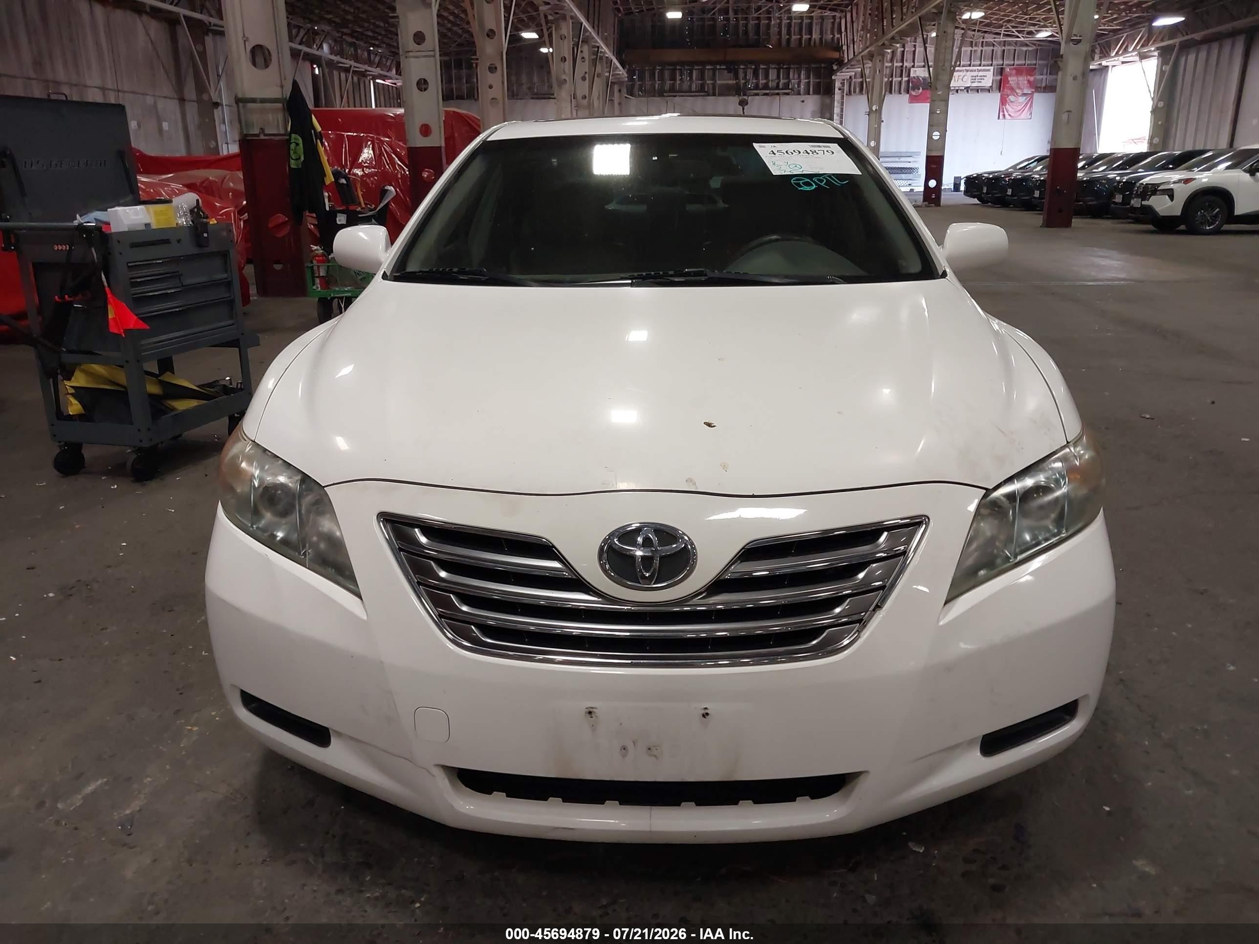 2008 Toyota Camry Hybrid   White vin: JTNBB46K983046273