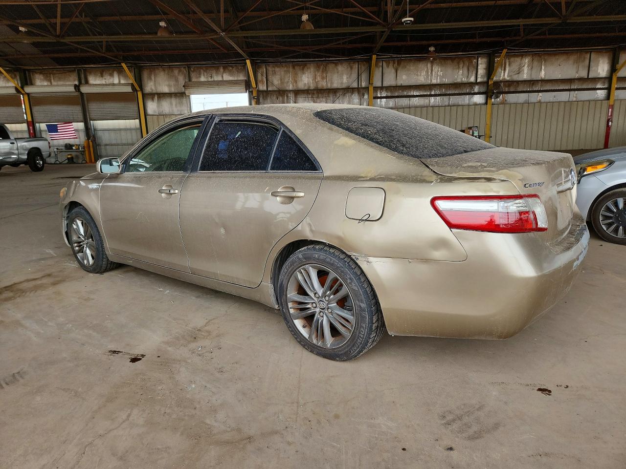 2009 Toyota Camry Hybrid Gold vin: JTNBB46K993052205