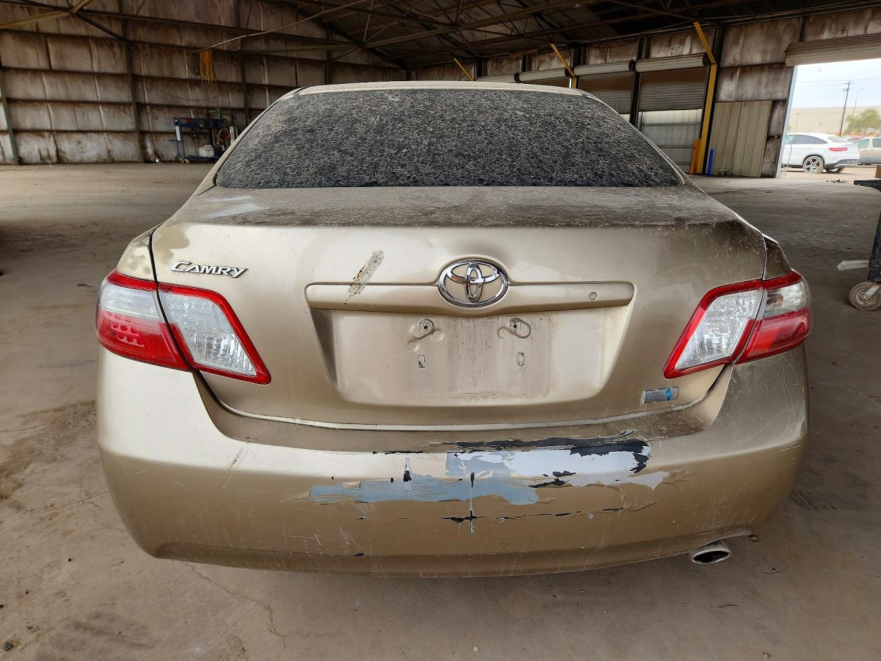 2009 Toyota Camry Hybrid Gold vin: JTNBB46K993052205