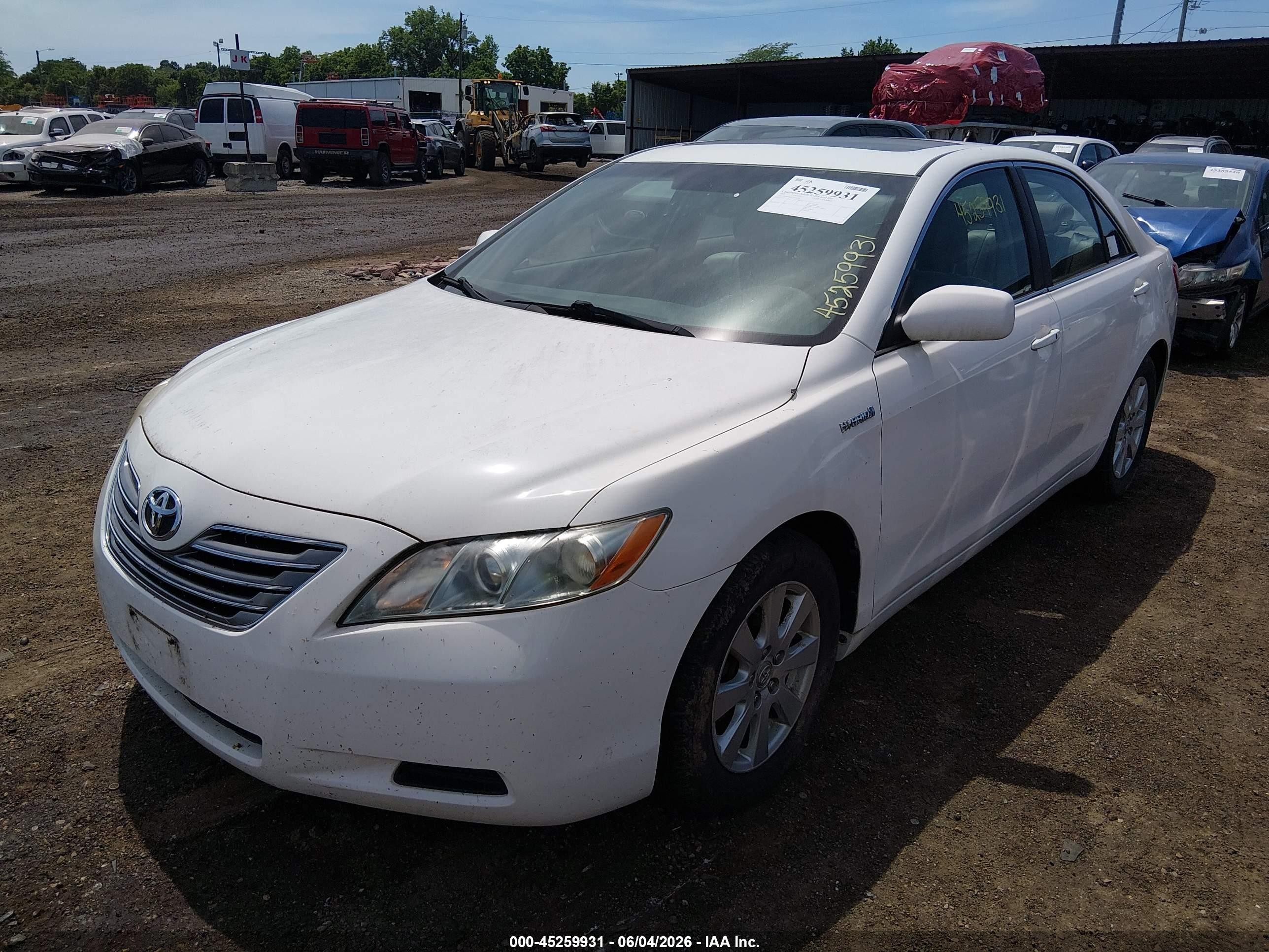 2007 Toyota Camry Hybrid   White vin: JTNBB46KX73009490