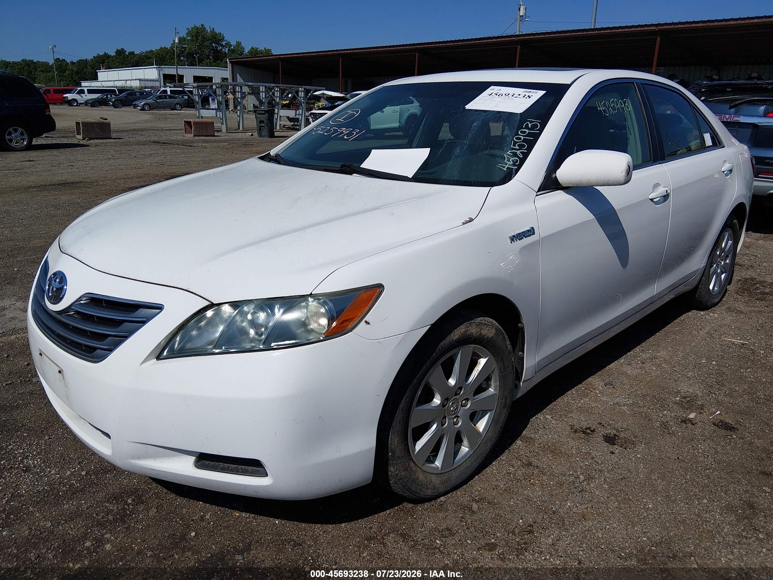 2007 Toyota Camry Hybrid   White vin: JTNBB46KX73009490