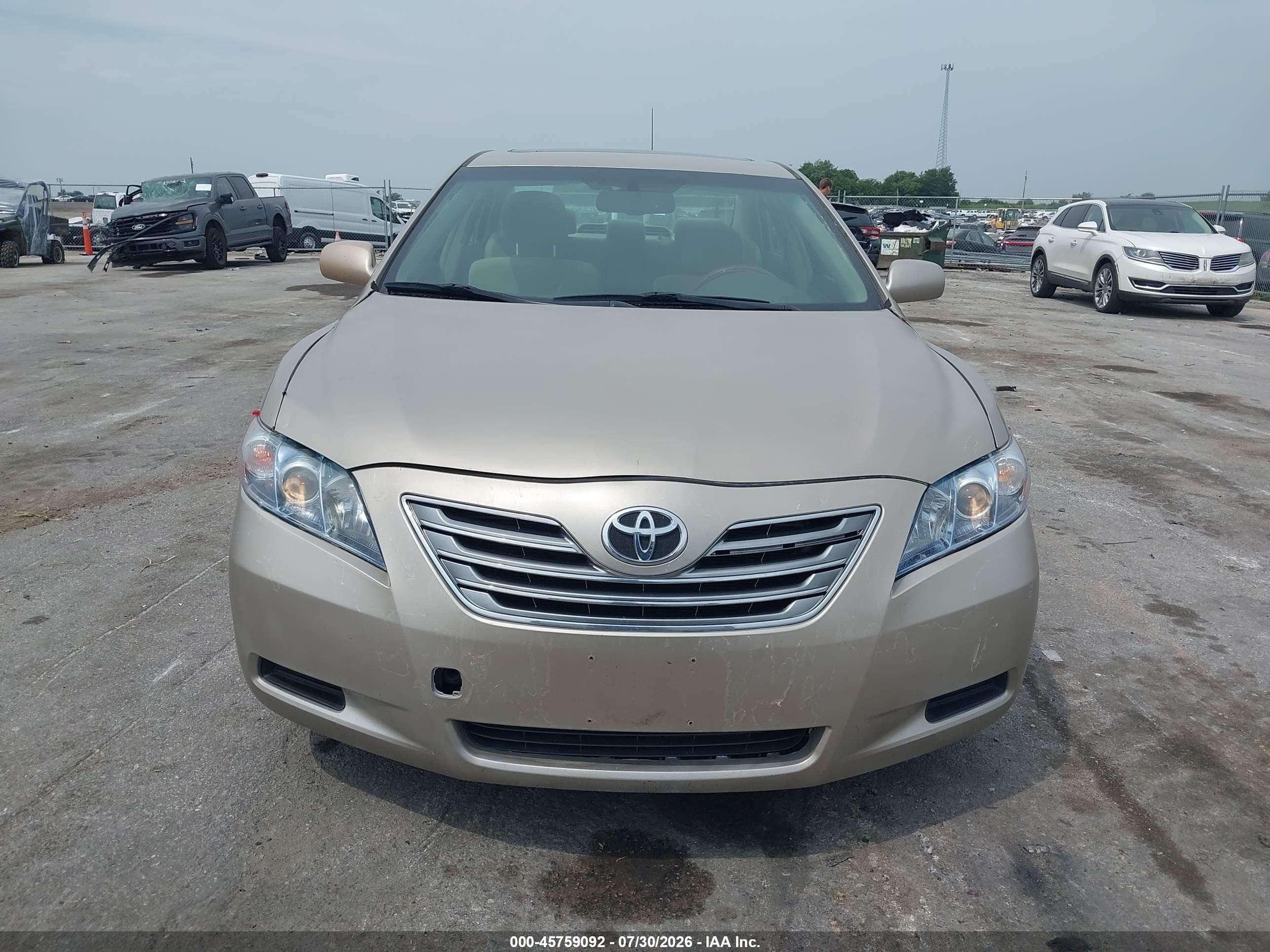 2007 Toyota Camry Hybrid   Tan vin: JTNBB46KX73019324