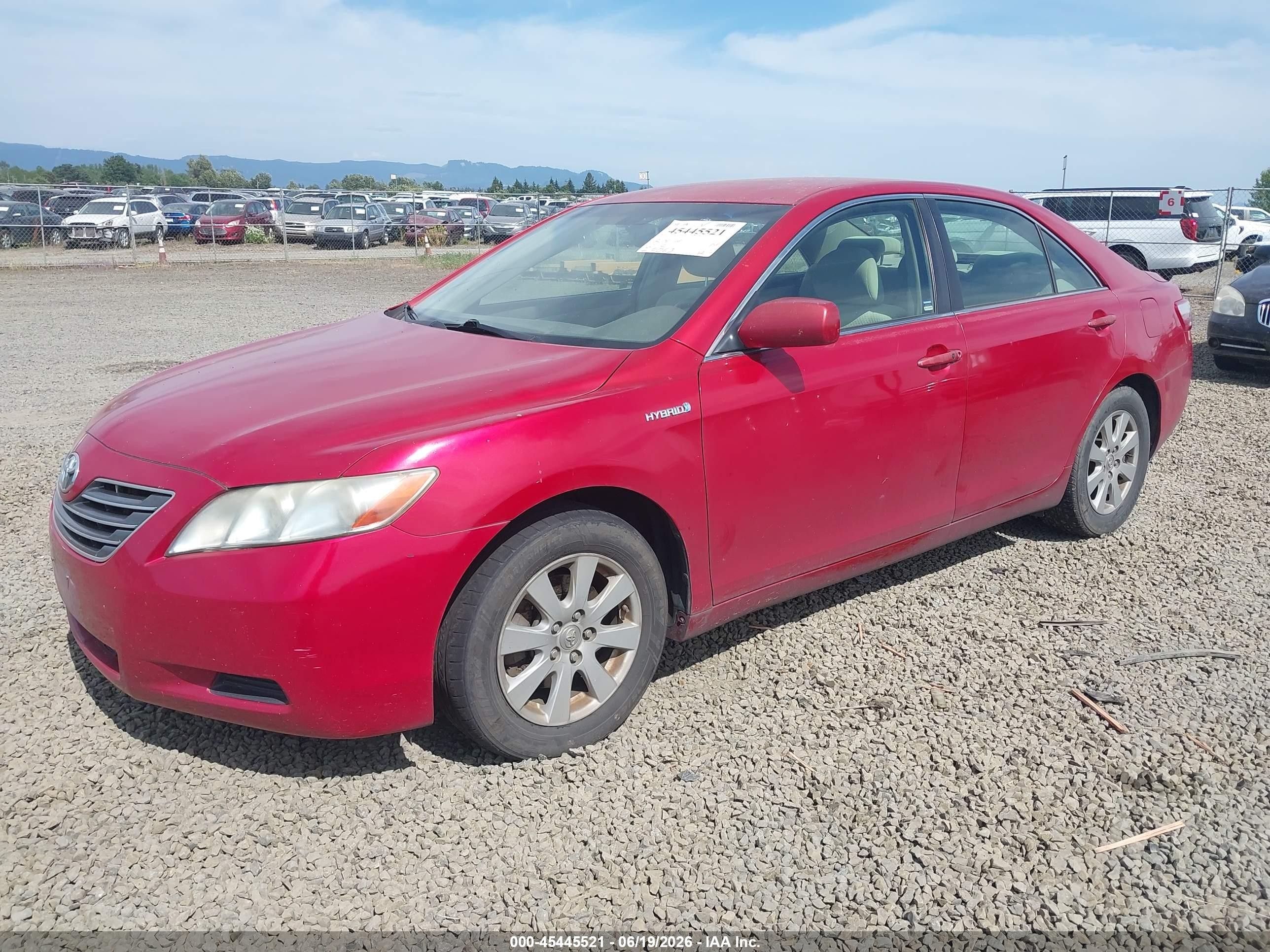 2007 Toyota Camry Hybrid   Red vin: JTNBB46KX73032204