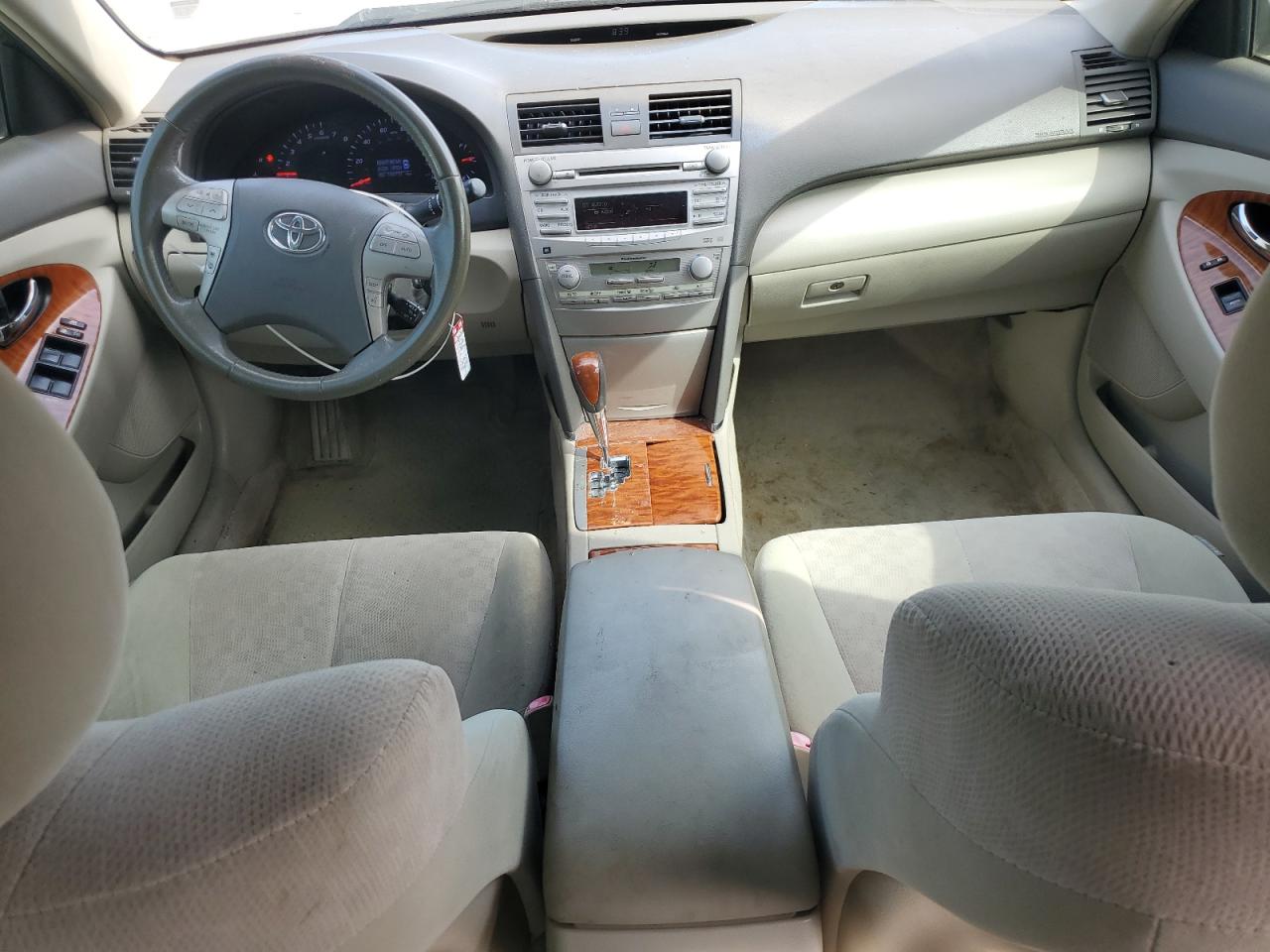 2010 Toyota Camry Base Золотой vin: JTNBF3EK9A3003753