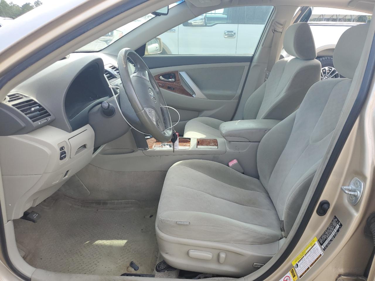 2010 Toyota Camry Base Золотой vin: JTNBF3EK9A3003753