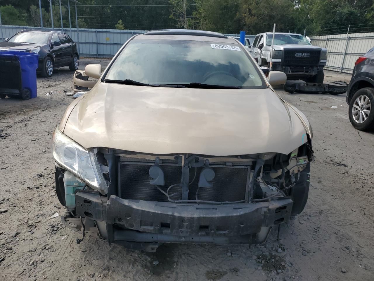 2010 Toyota Camry Base Золотой vin: JTNBF3EK9A3003753