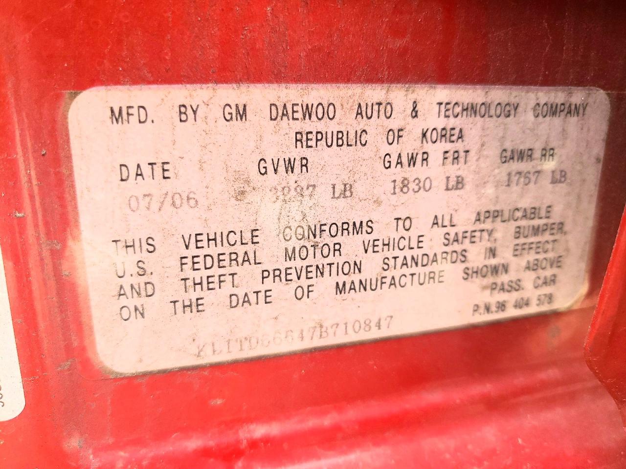 2007 Chevrolet Aveo Base Red vin: KL1TD66647B710847