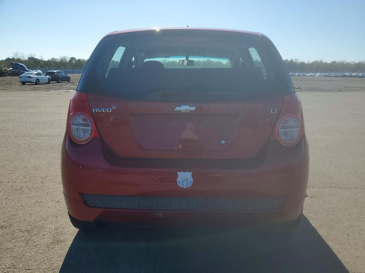 2009 Chevrolet Aveo Красный vin: KL1TD66E79B667017