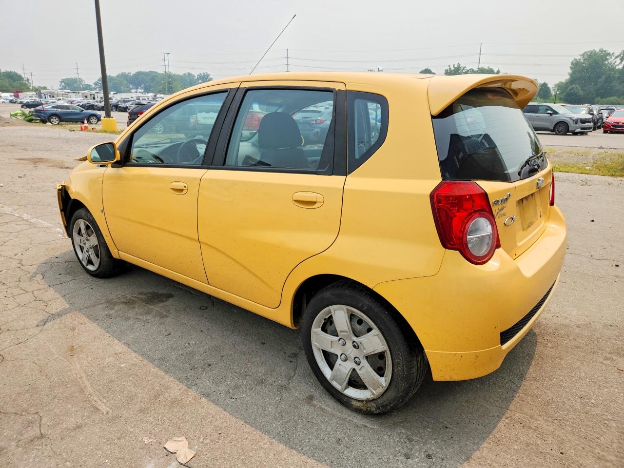 2009 Chevrolet Aveo Lt Желтый vin: KL1TG66E99B318318