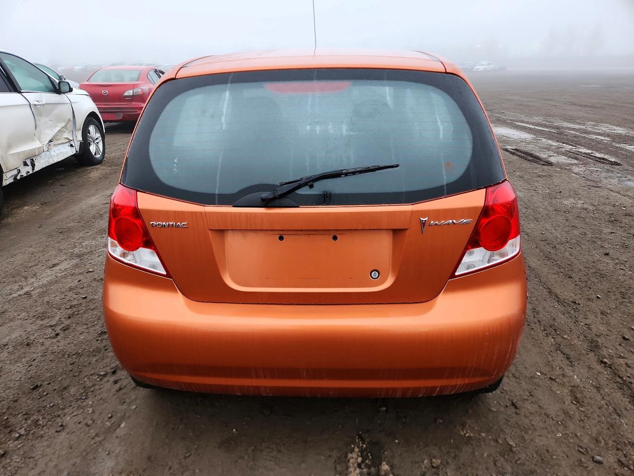 2007 Pontiac Wave Оранжевый vin: KL2TD65647B759494