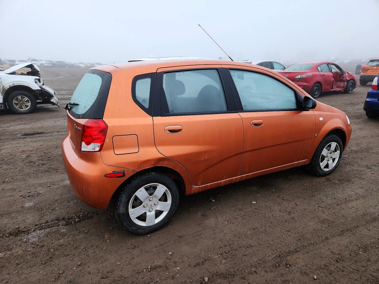 2007 Pontiac Wave Оранжевый vin: KL2TD65647B759494