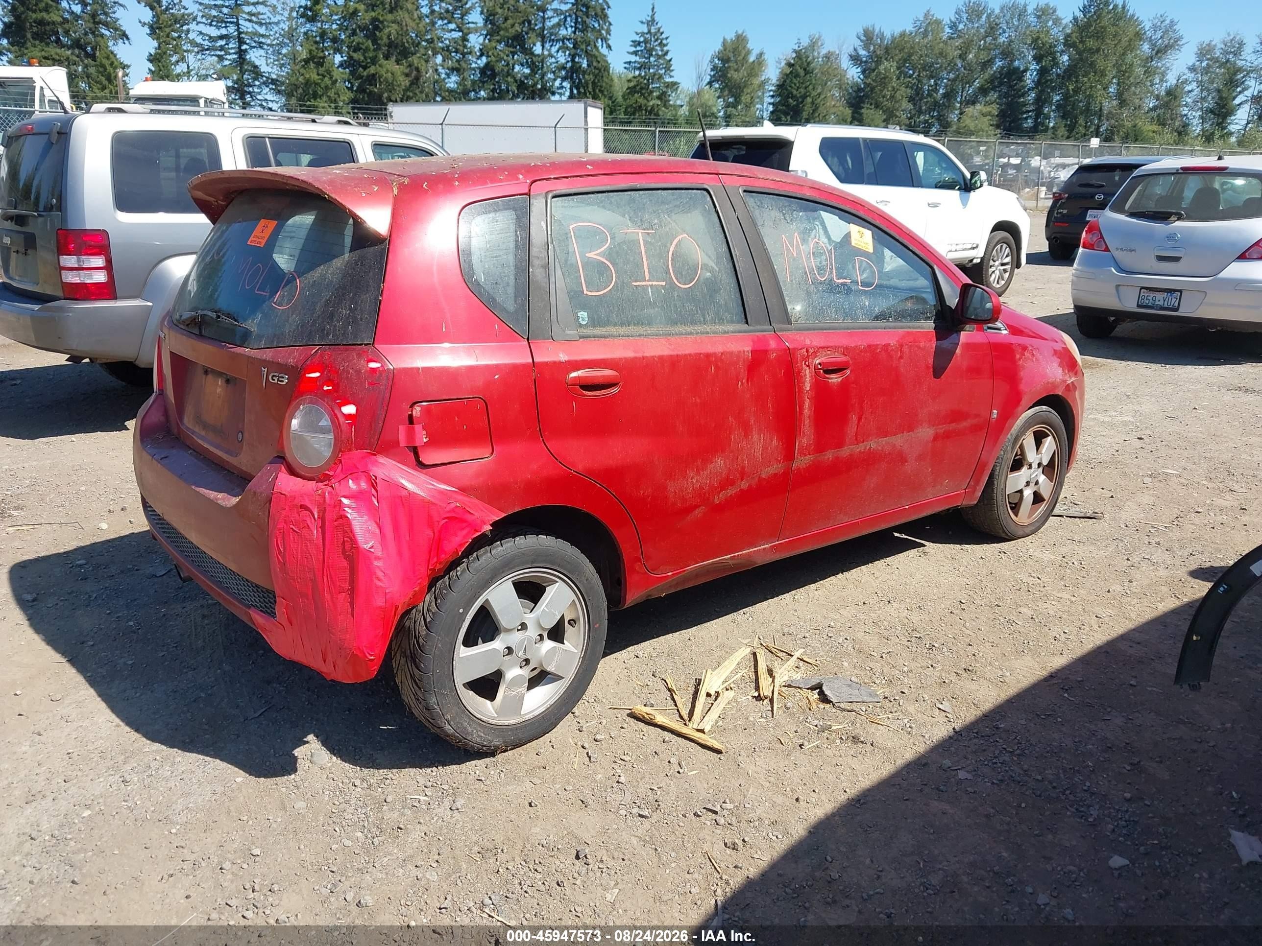 2009 Pontiac G3   Red vin: KL2TD66E59B663186