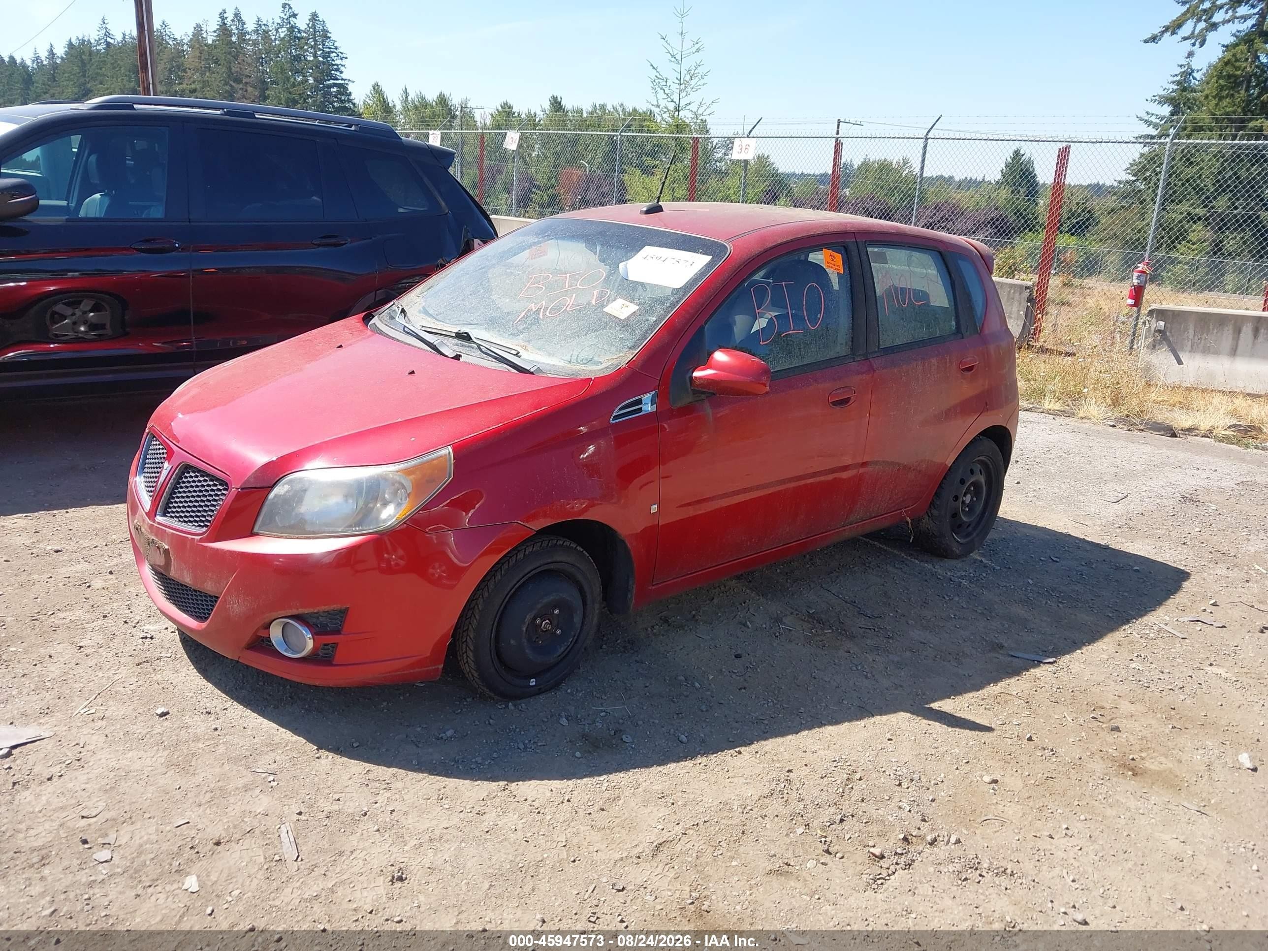 2009 Pontiac G3   Red vin: KL2TD66E59B663186