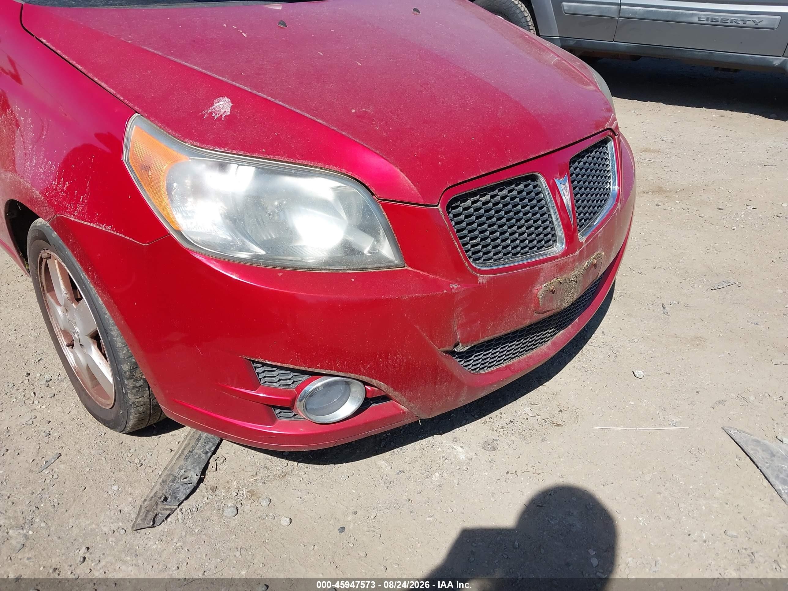 2009 Pontiac G3   Red vin: KL2TD66E59B663186