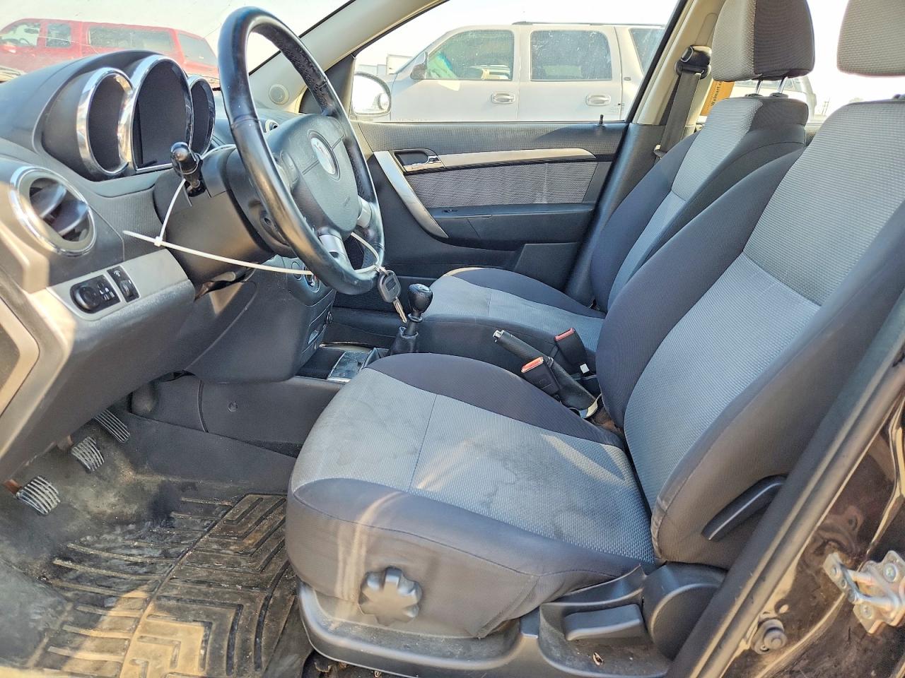 2009 Pontiac G3 Черный vin: KL2TD66E79B686727