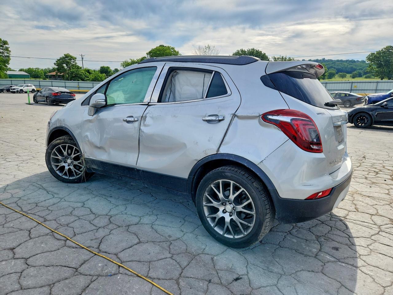 2017 Buick Encore Sport Touring Серебряный vin: KL4CJ1SMXHB099744