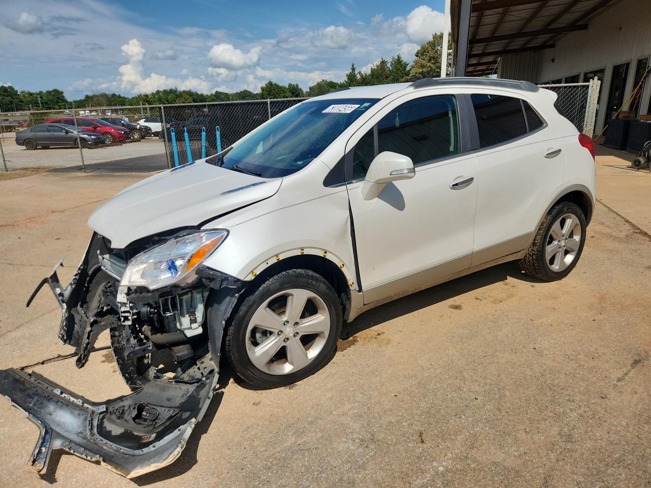 2015 Buick Encore White vin: KL4CJASB1FB235626 Damage: Left Front Fender, Dent(S) W/ Paint Dmg, > 12 Inches