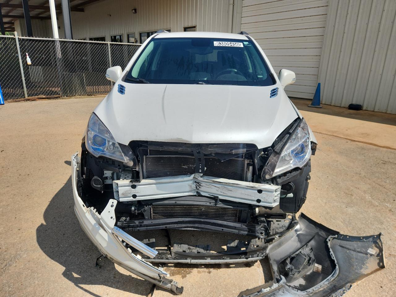 2015 Buick Encore White vin: KL4CJASB1FB235626 Damage: Left Head Lamp, Broken, Replacement Required