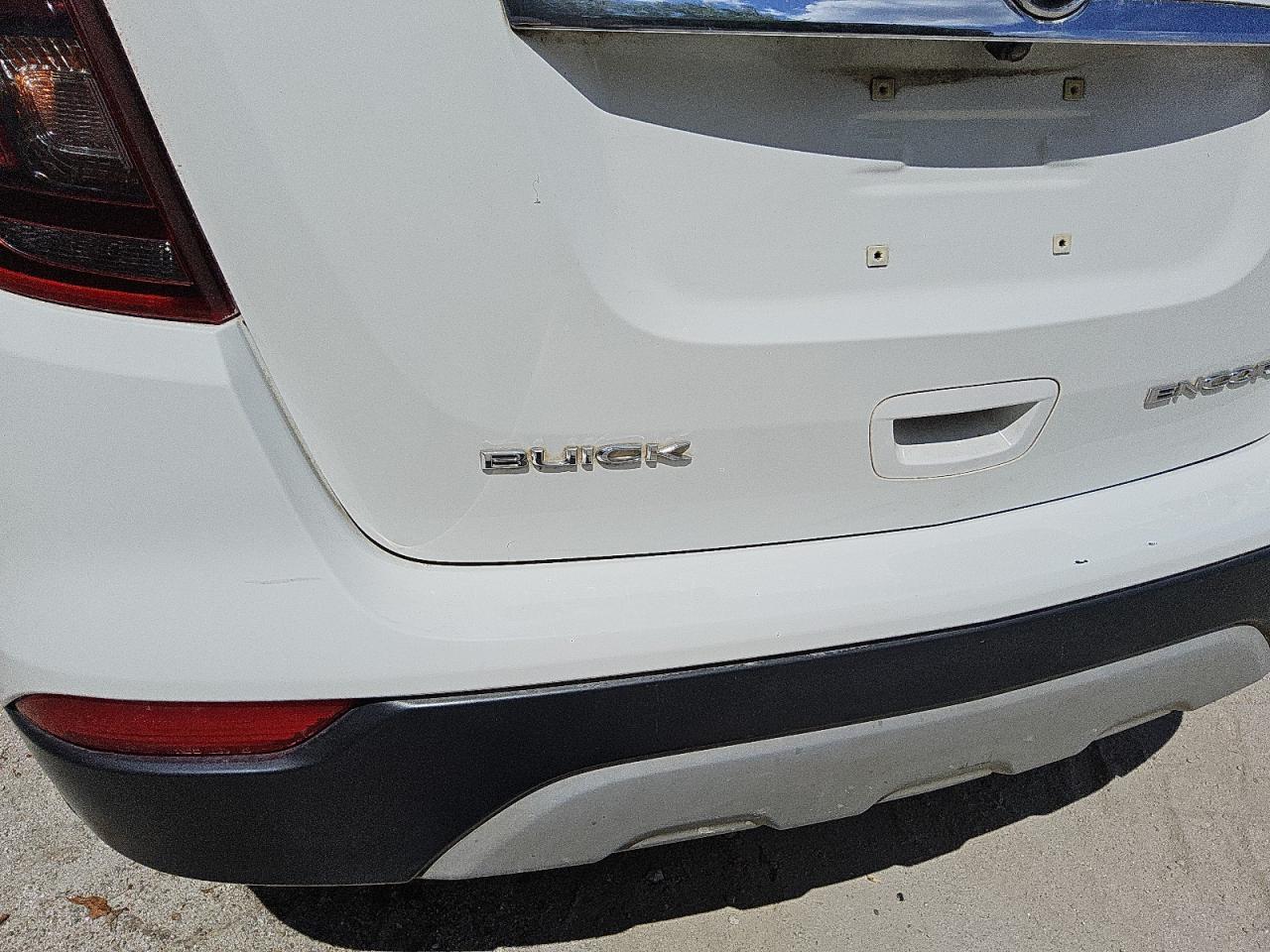 2017 Buick Encore Preferred White vin: KL4CJASB1HB059051 Damage: Rear Bumper, Chipped, 3