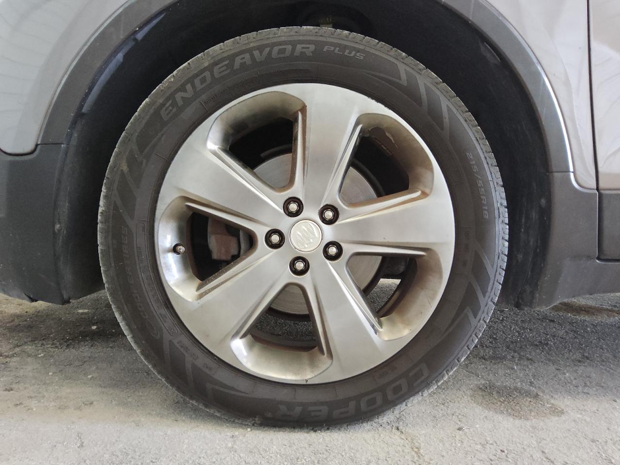 2014 Buick Encore Tan vin: KL4CJASBXEB641936 Damage: Right Rear Wheel, Curb Rash, 2 To 3 Inches