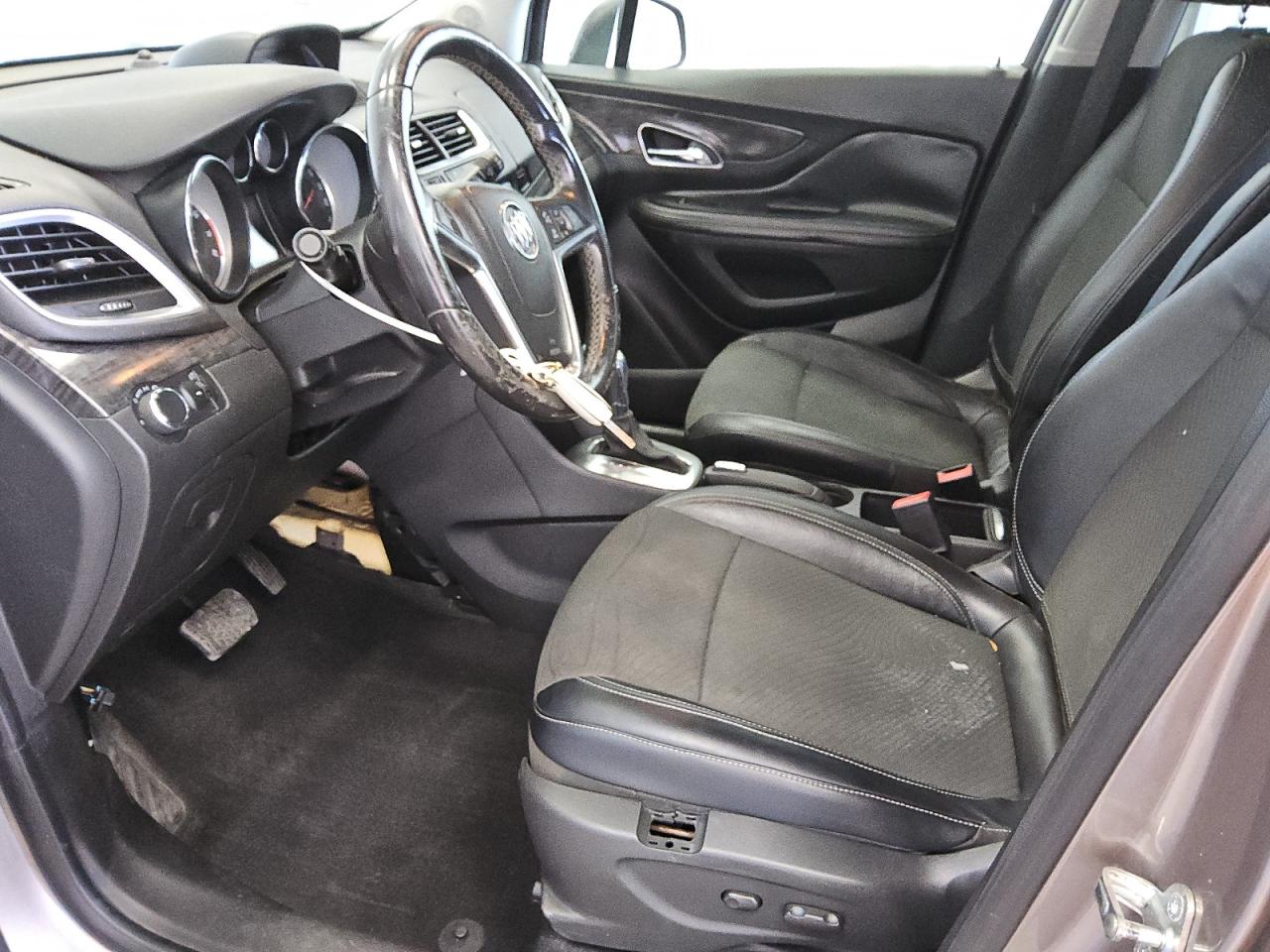 2014 Buick Encore Tan vin: KL4CJASBXEB641936 Damage: Left Front Seat Molding, Heavy Scratch, 2 To 3 Inches