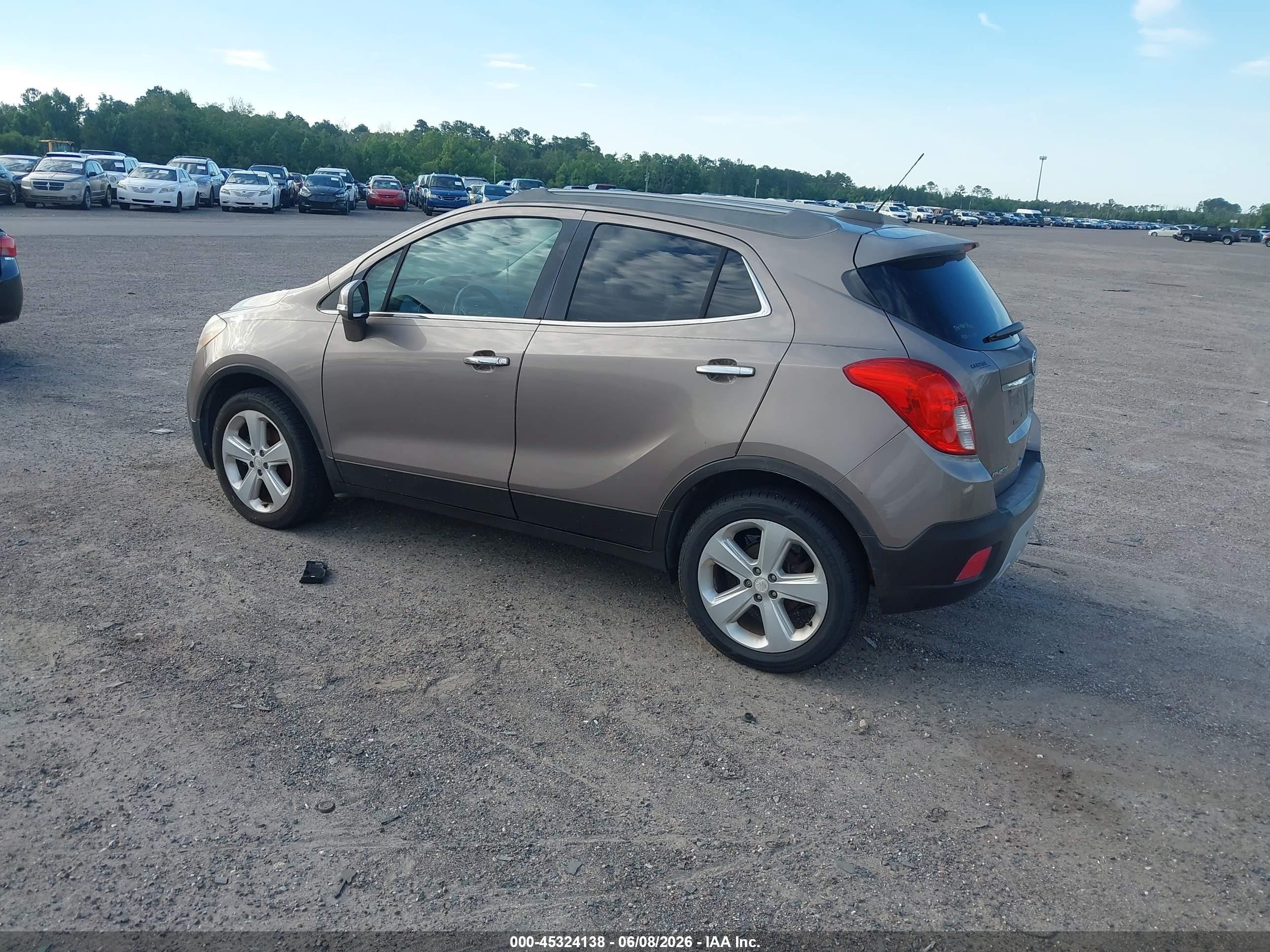 2015 Buick Encore Convenience Gold vin: KL4CJBSB1FB044178