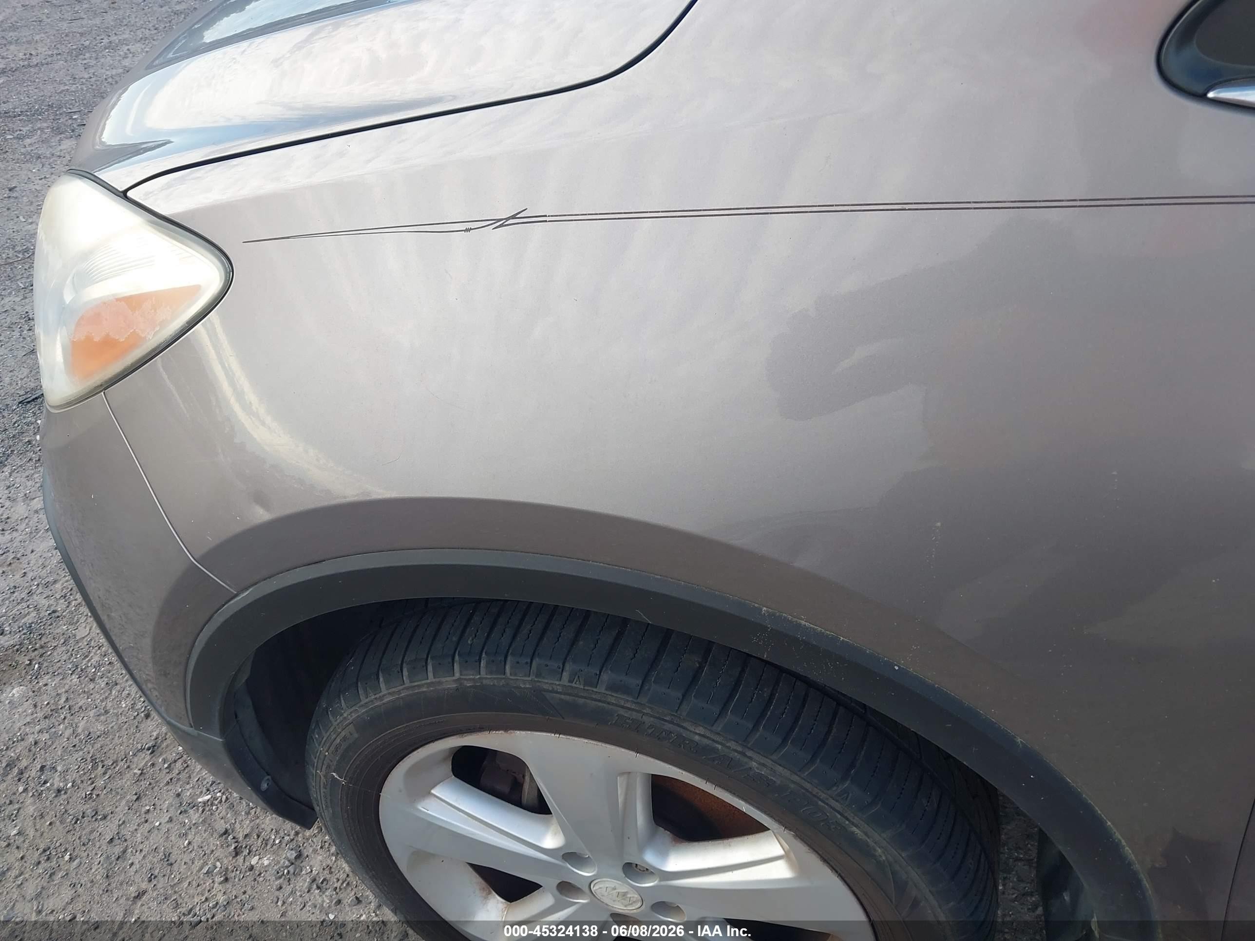 2015 Buick Encore Convenience Gold vin: KL4CJBSB1FB044178