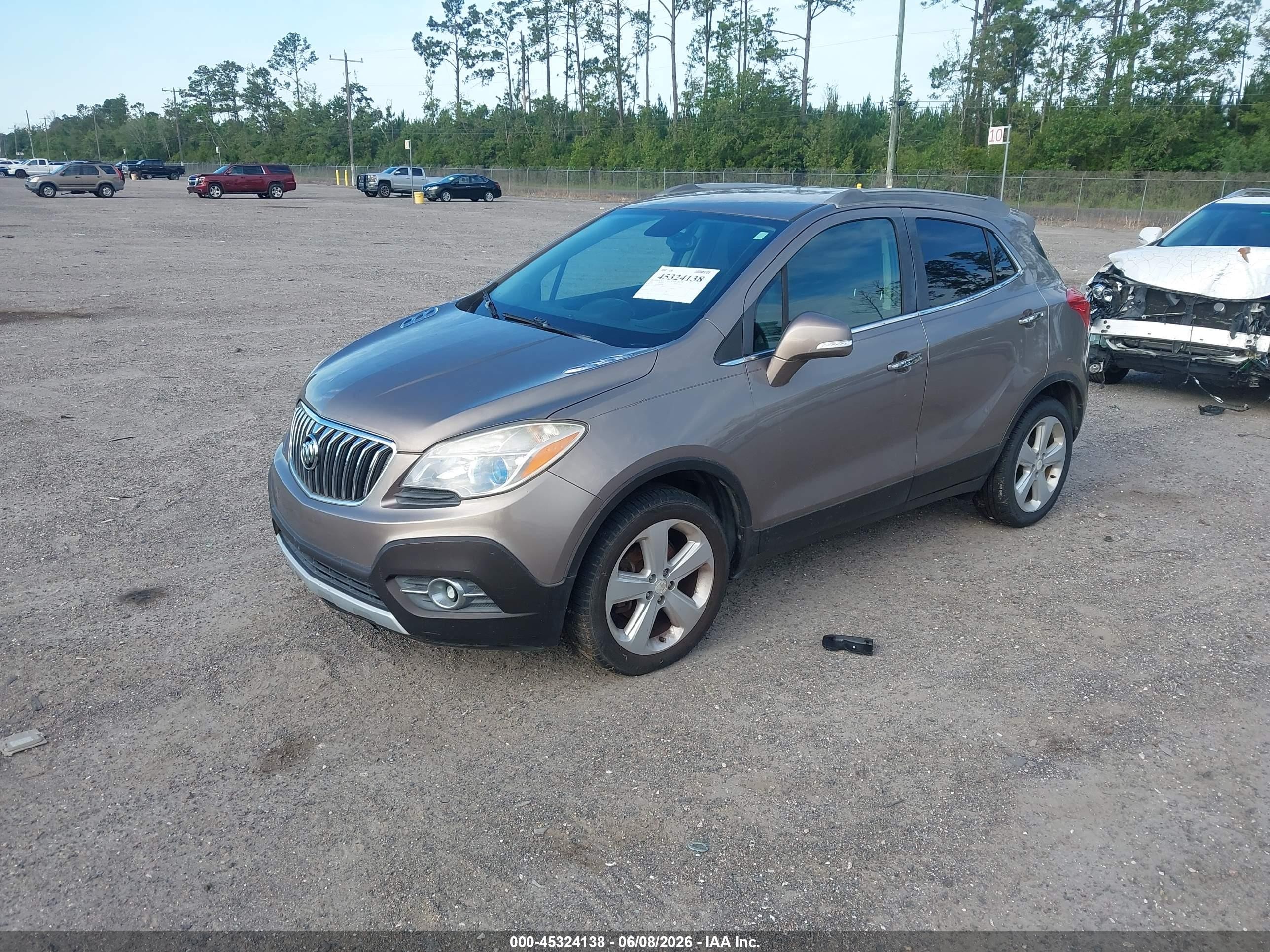 2015 Buick Encore Convenience Gold vin: KL4CJBSB1FB044178