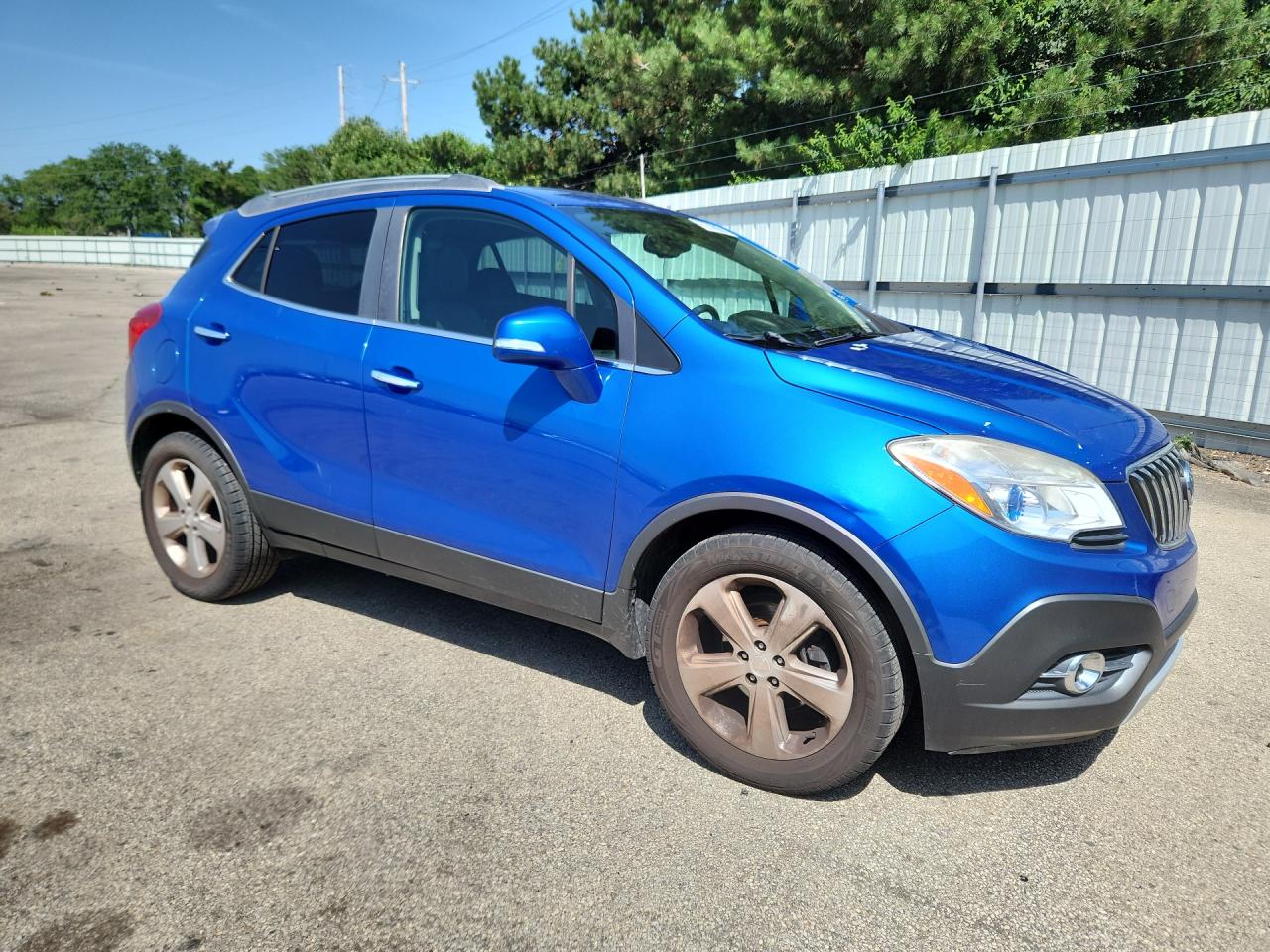 2015 Buick Encore Convenience Blue vin: KL4CJBSB5FB217054 Damage: Right Front Fender, Dent(S) W/ Paint Dmg, 6 To 7 Inches