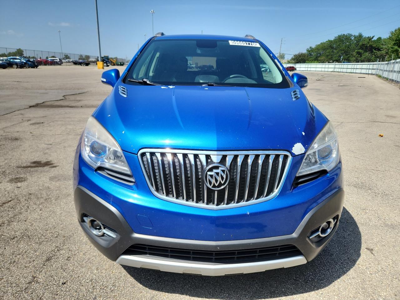 2015 Buick Encore Convenience Blue vin: KL4CJBSB5FB217054 Damage: Hood, Peeling, 7 To 8 Inches
